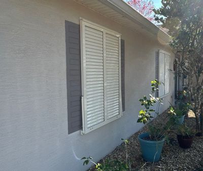 Hurricane Rated Bahama Shutters in Cream