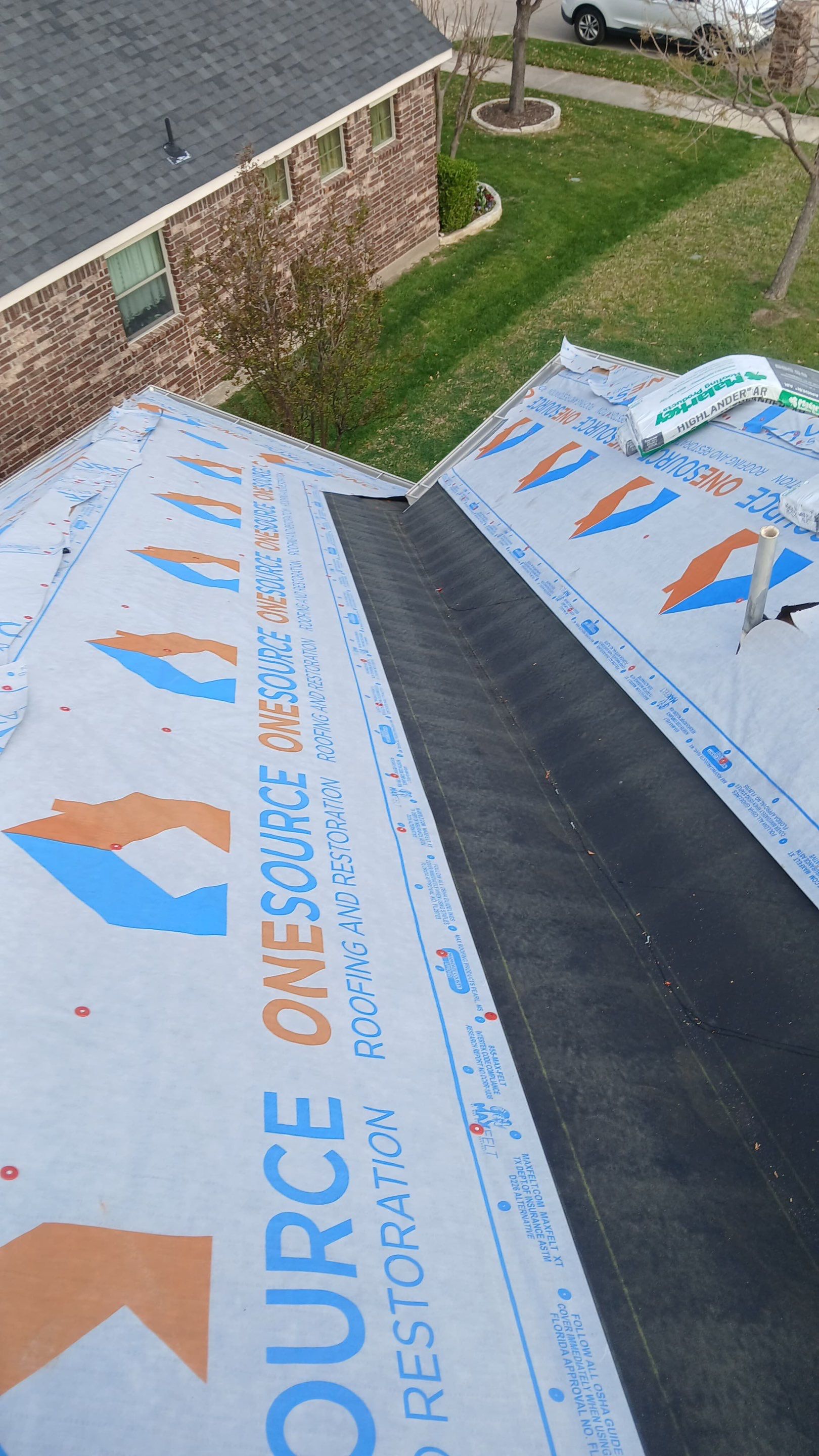 Residential Roofing Installation using Malarkey Highlander Weathered Wood Plus by OneSource Roofing and Restoration