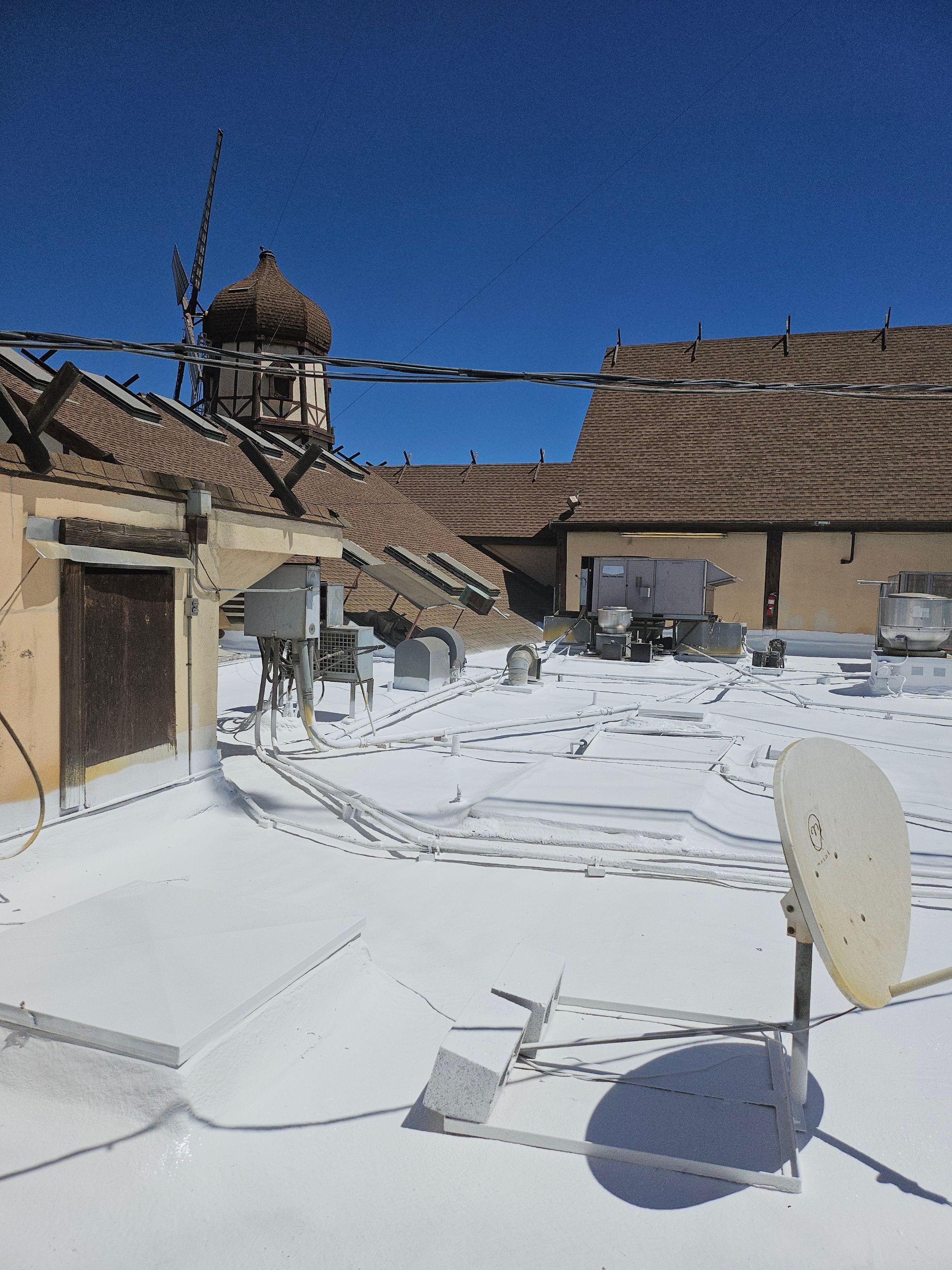 Spray foam and coatings using General Coatings acrylic coatings and spray foam by Straight Edge Roofing Inc
