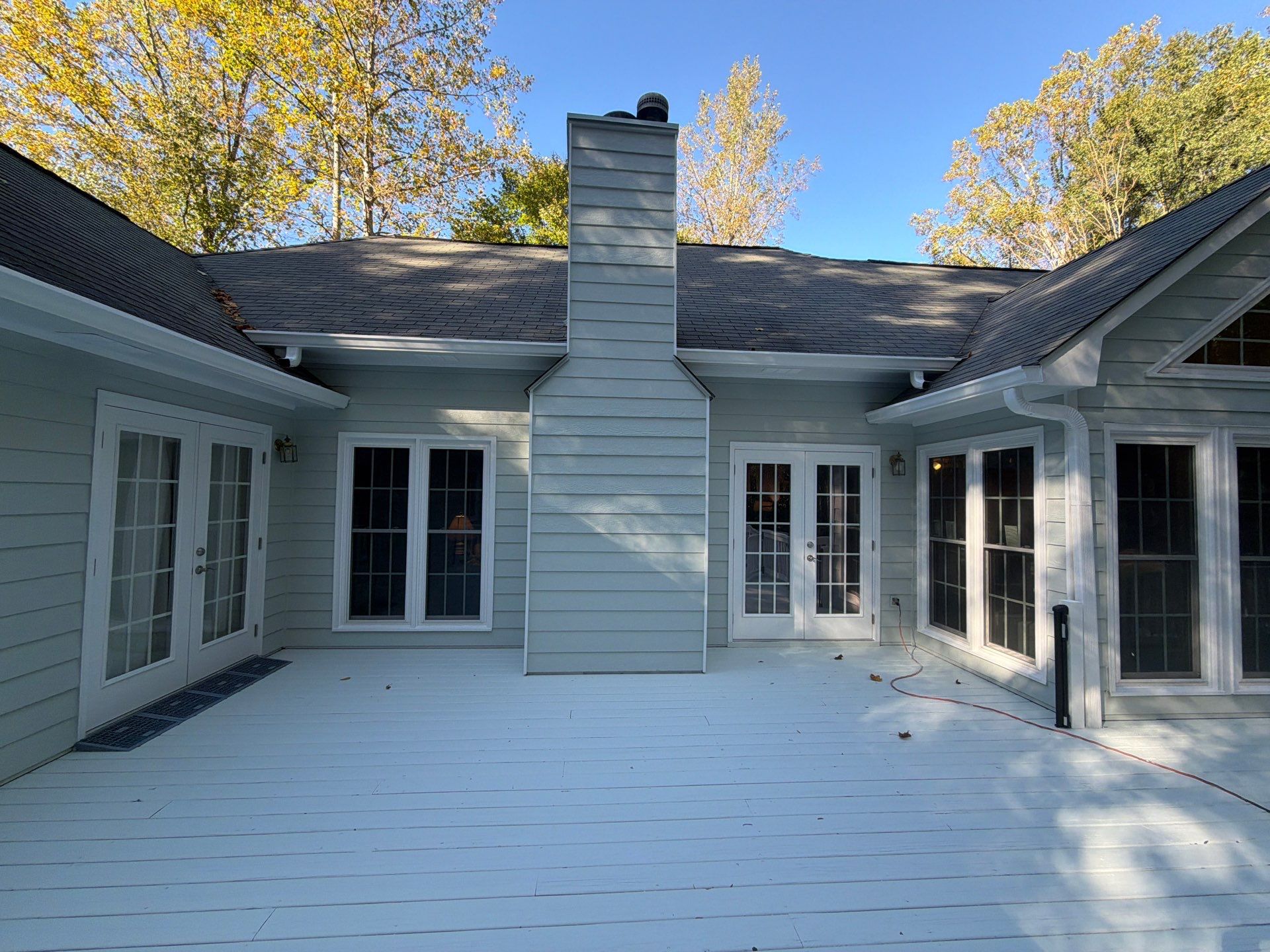 Exterior Residential Painting and Deck Refinishing in Canton, Georgia by Swift Home Renovations 