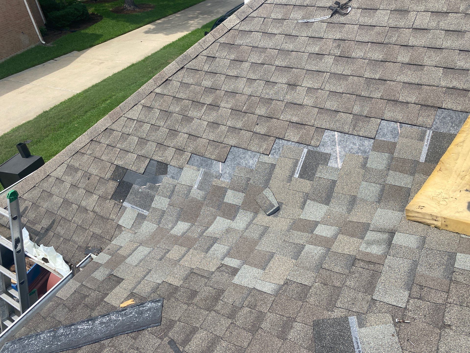 Hail Damage using Owen's Corning Duration (Lifetime) Shingles by Roof Repair Company