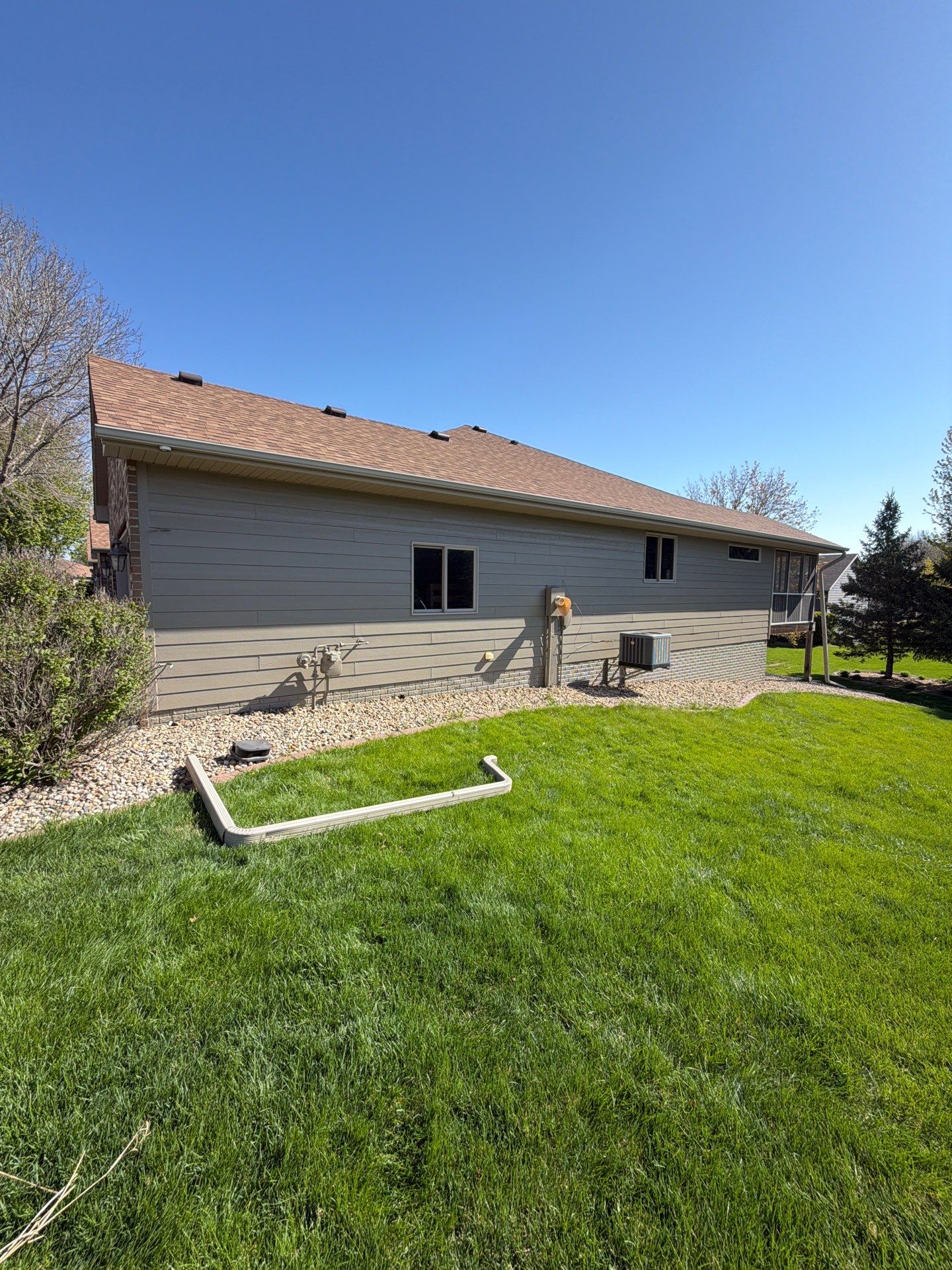 Residential Exterior Siding and Trim Painting in Sioux Falls by Select Painting, Coatings & Garage Cabinets