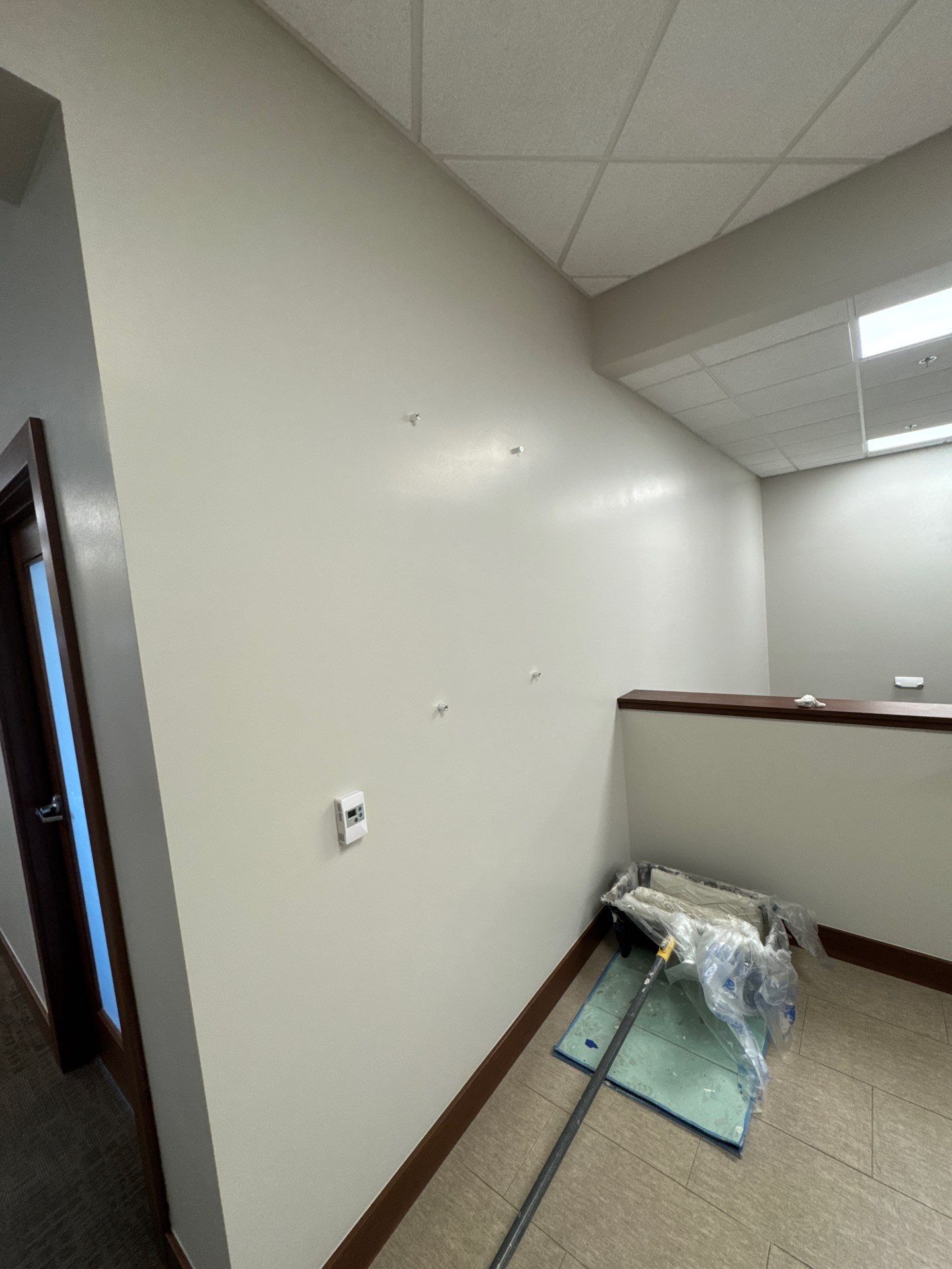Commercial Office Interior Remodel and Modern Suite Refresh in Sioux Falls by Select Painting, Coatings & Garage Cabinets