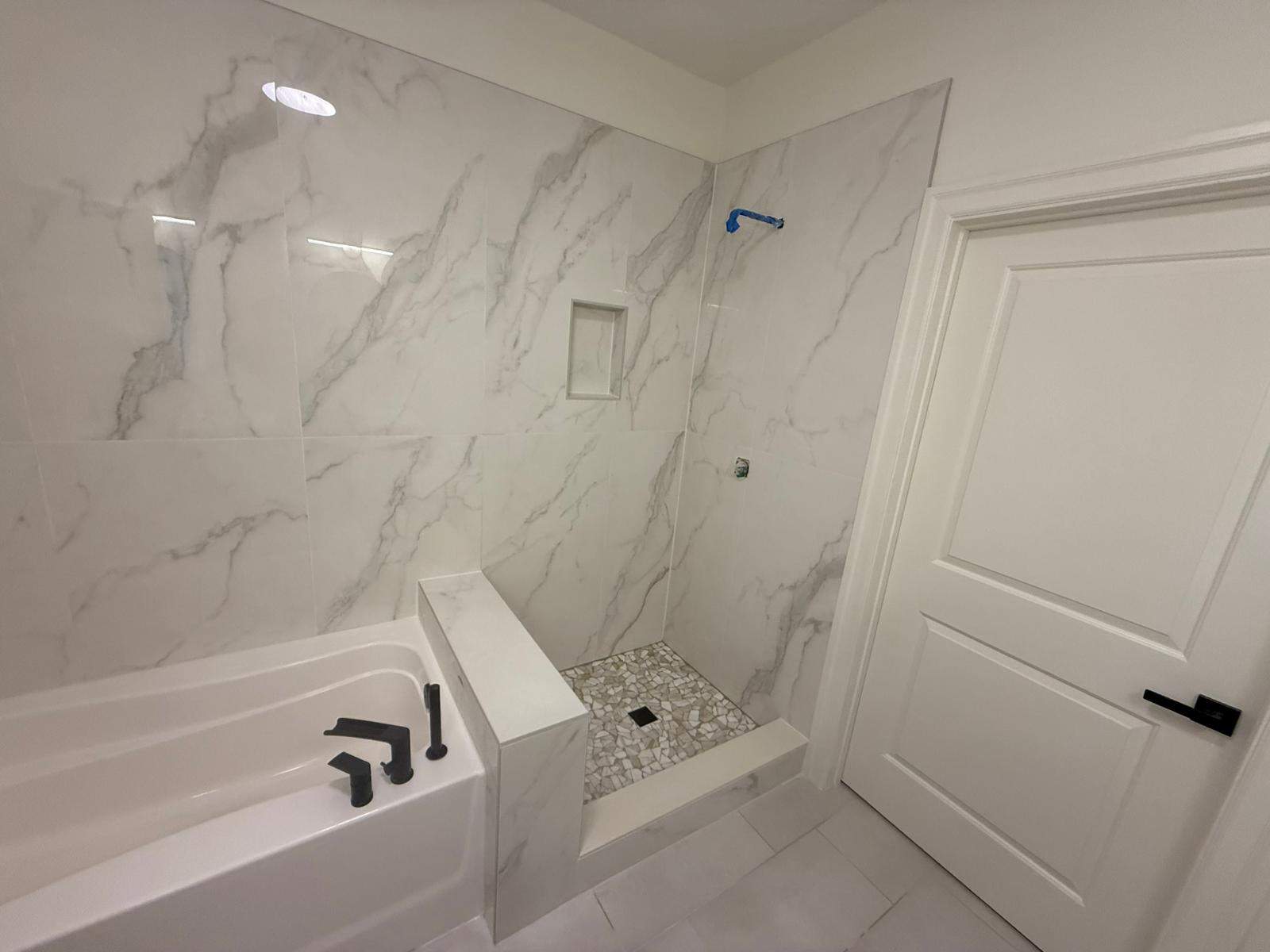 Shower and tub tiling  by Prudencio
