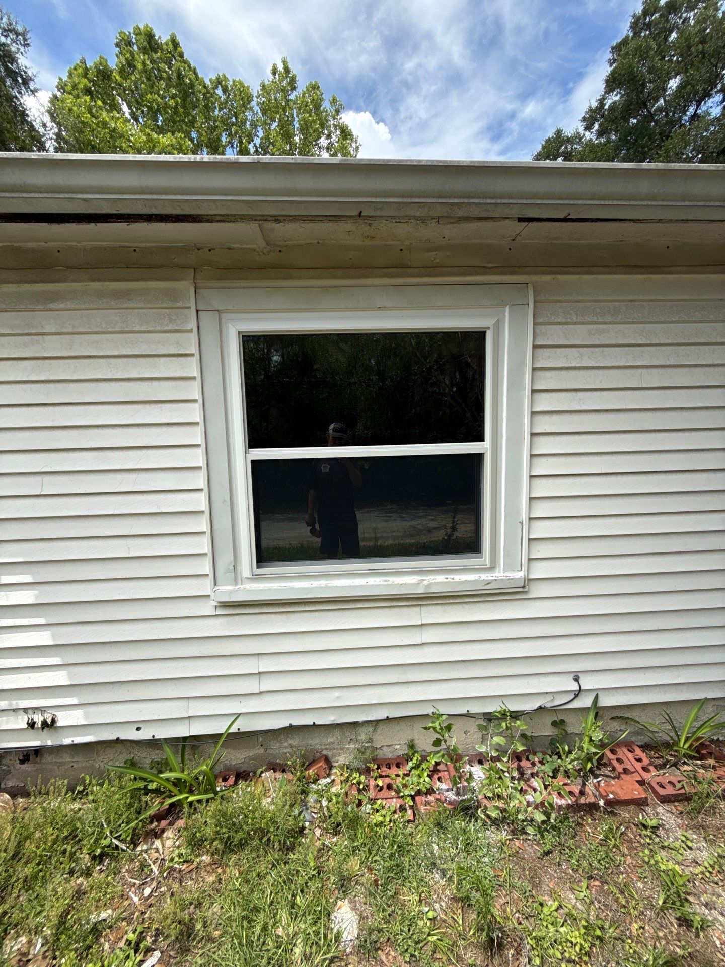 White Vinyl Window Replacement for Residential Home in Williston by Windows & Doors Store