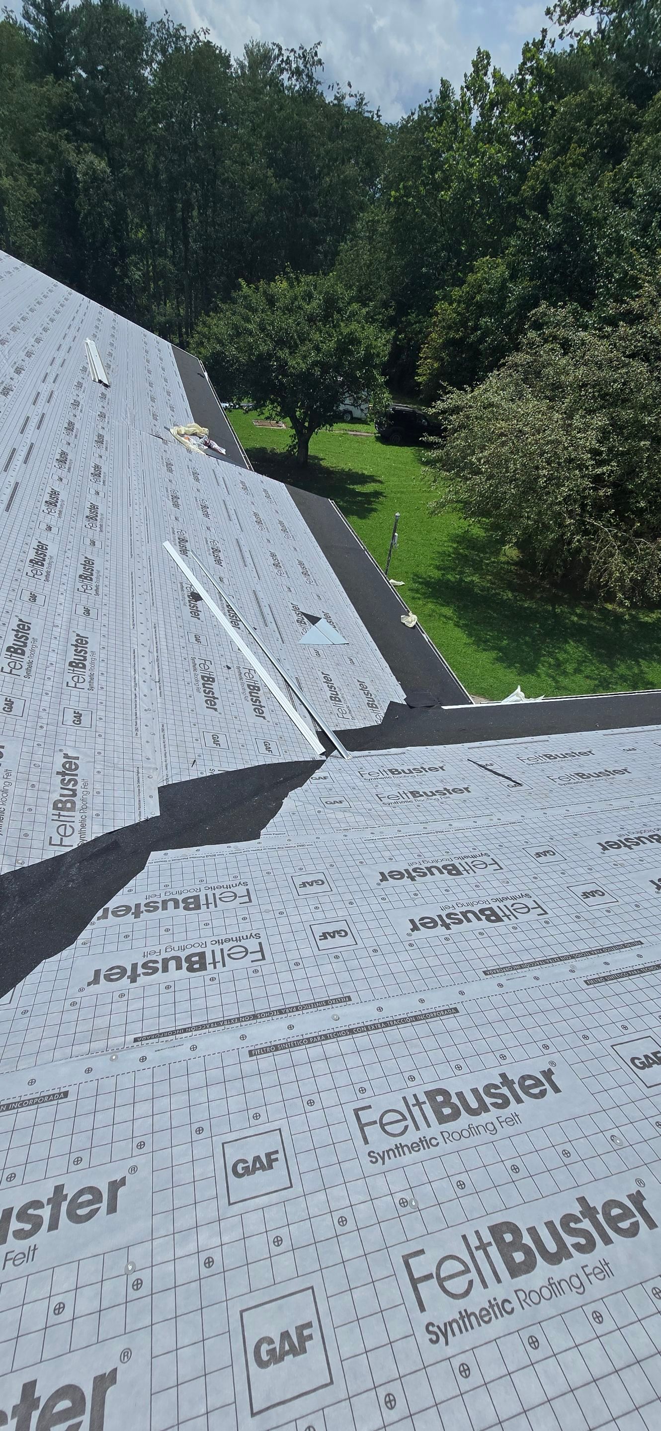 Residential Roofing Installation using GAF Timberline HDZ Charcoal by Rainstoppers Roofing