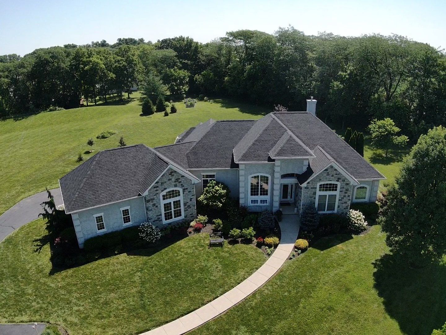 Residential Roofing Installation using Atlas Pinnacle Black Shingles by 614 Exteriors