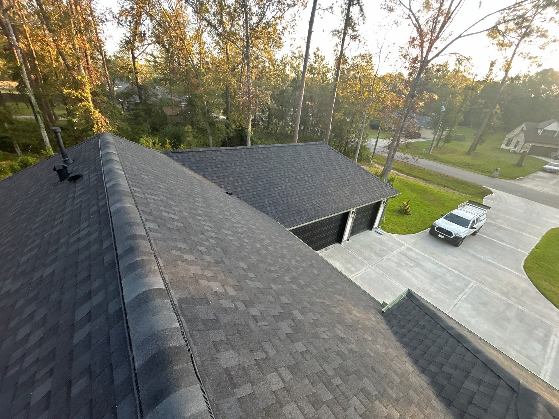 TAMKO Titan XT Rustic Black by STX Roofing