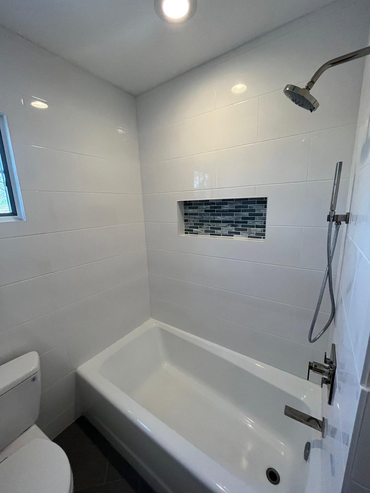 Bathroom Remodel using Tile by Home Concepts Construction