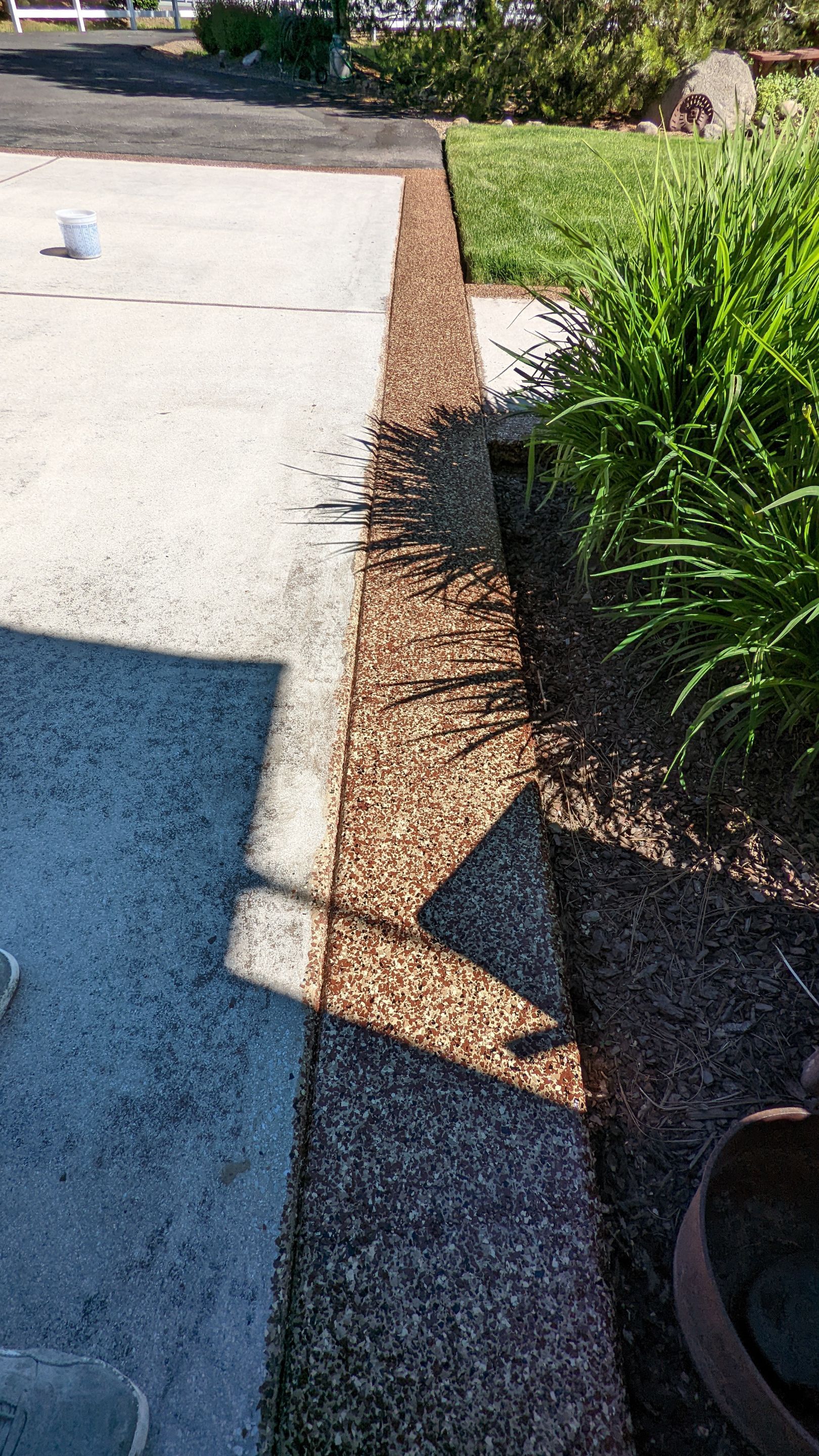 Driveway using Pecan and Chestnut Trim by Croc Coatings, LLC
