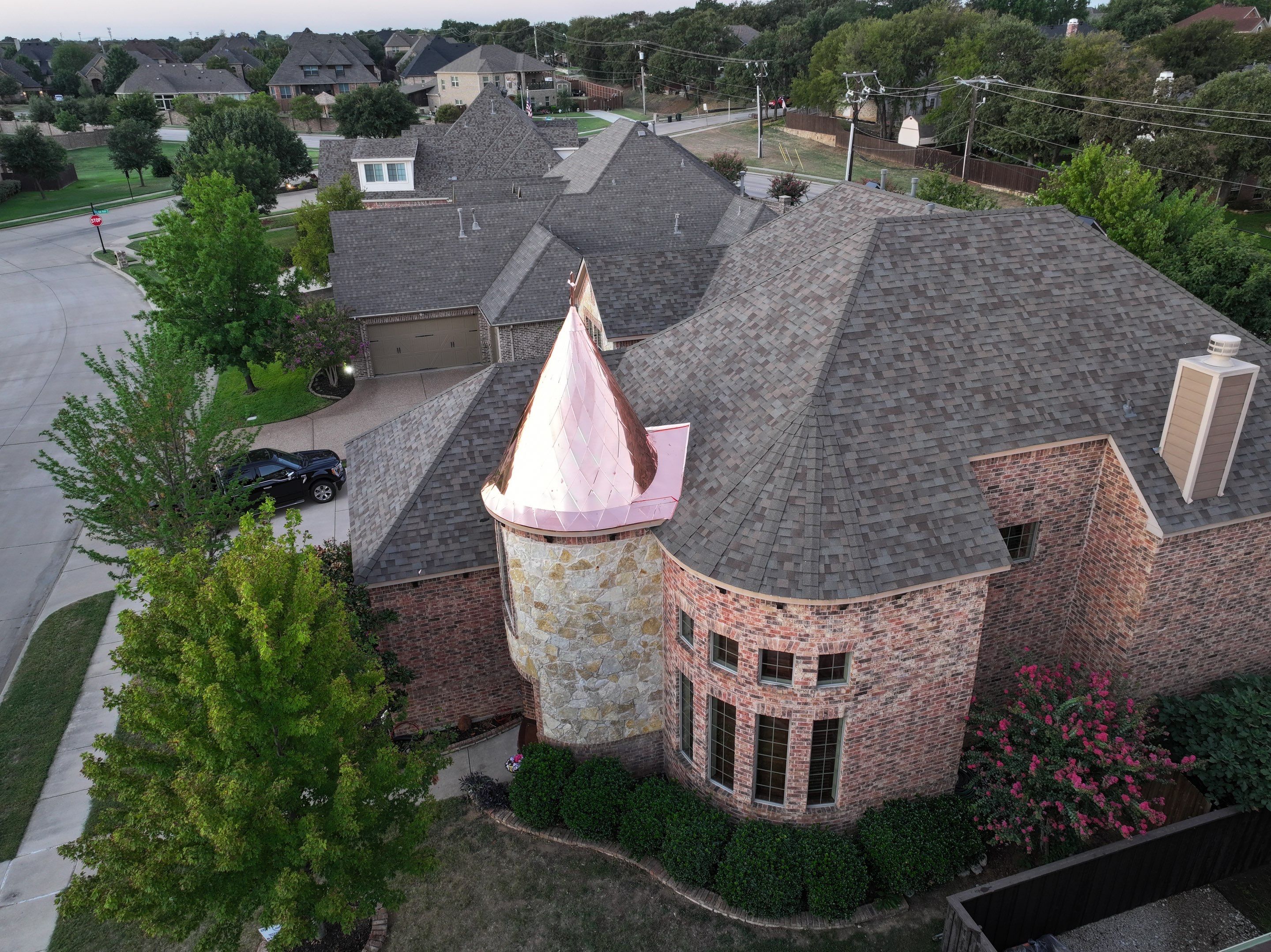 Installing Custom copper turret and Malarkey Vista Class 4 shingles Hail Damage Upgrade by Becker Roofing and Exteriors
