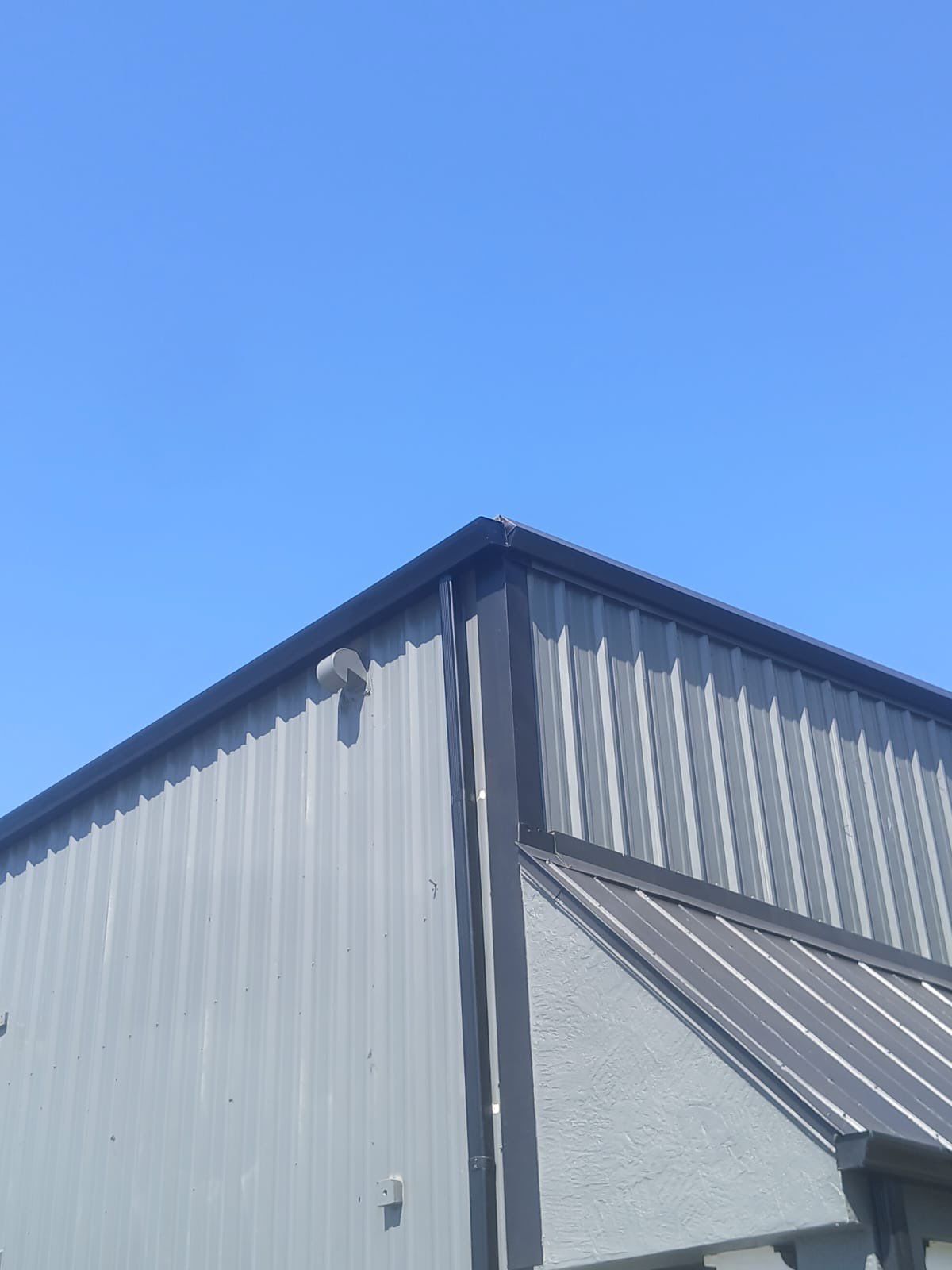Commercial Black Gutters and Downspouts in Bonita Springs, FL by Gutter Professors
