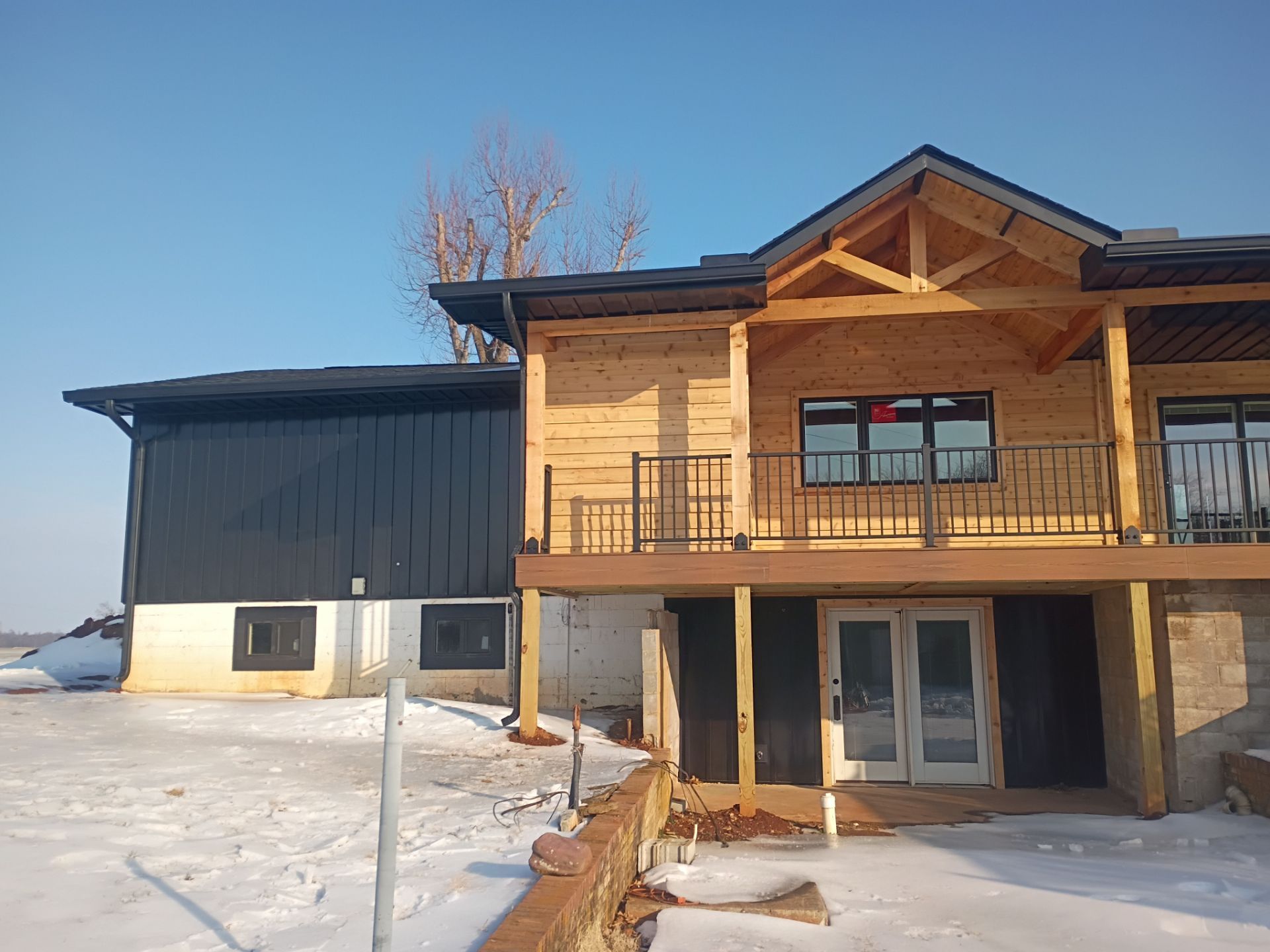 Black Gutter Install by First Choice Gutters LLC