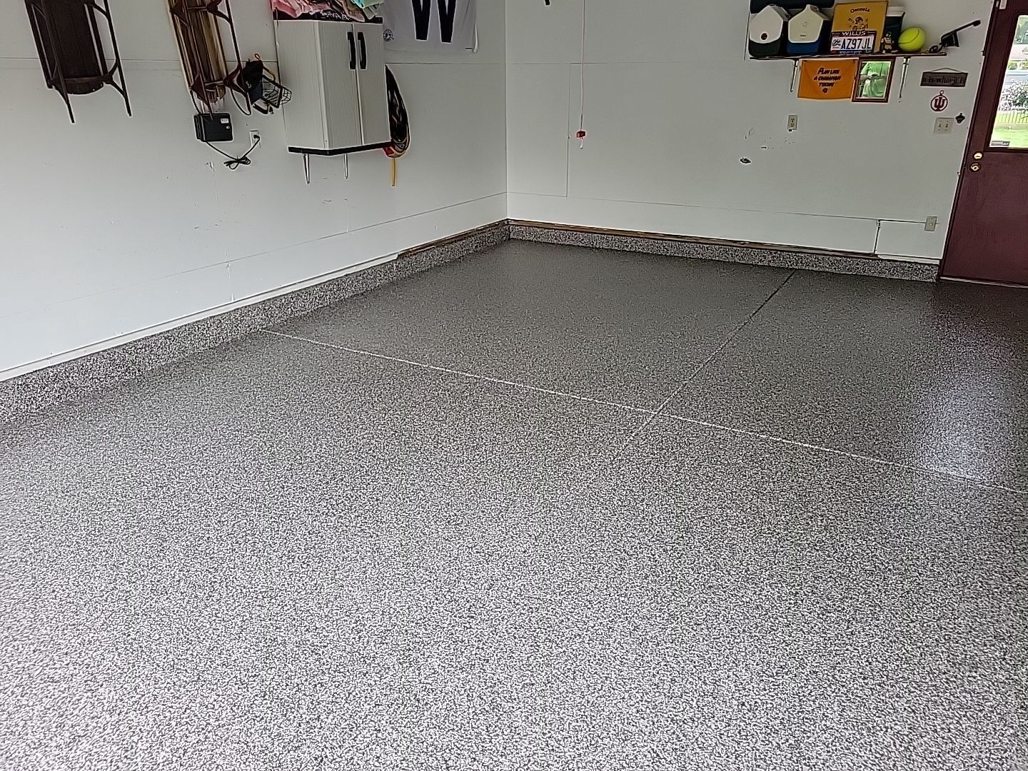 Garage and Porch Coating in Osceola by Innovative Spaces / Innovative Concrete Coatings