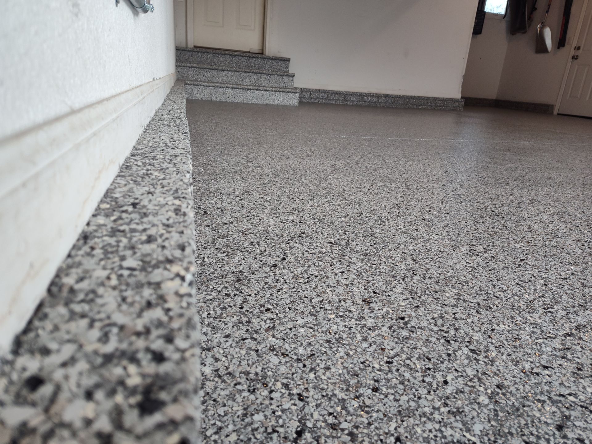 A Garage In One Day Keeps the Rock Salt Away! by Revival Concrete Coatings, LLC