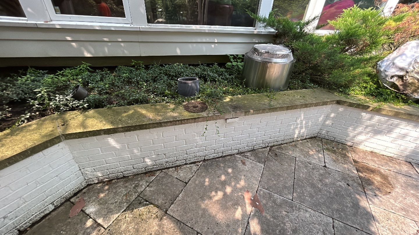 marble patio cleaning and sanding using Polysweep polymeric sand by Northern Power Washing LLC.