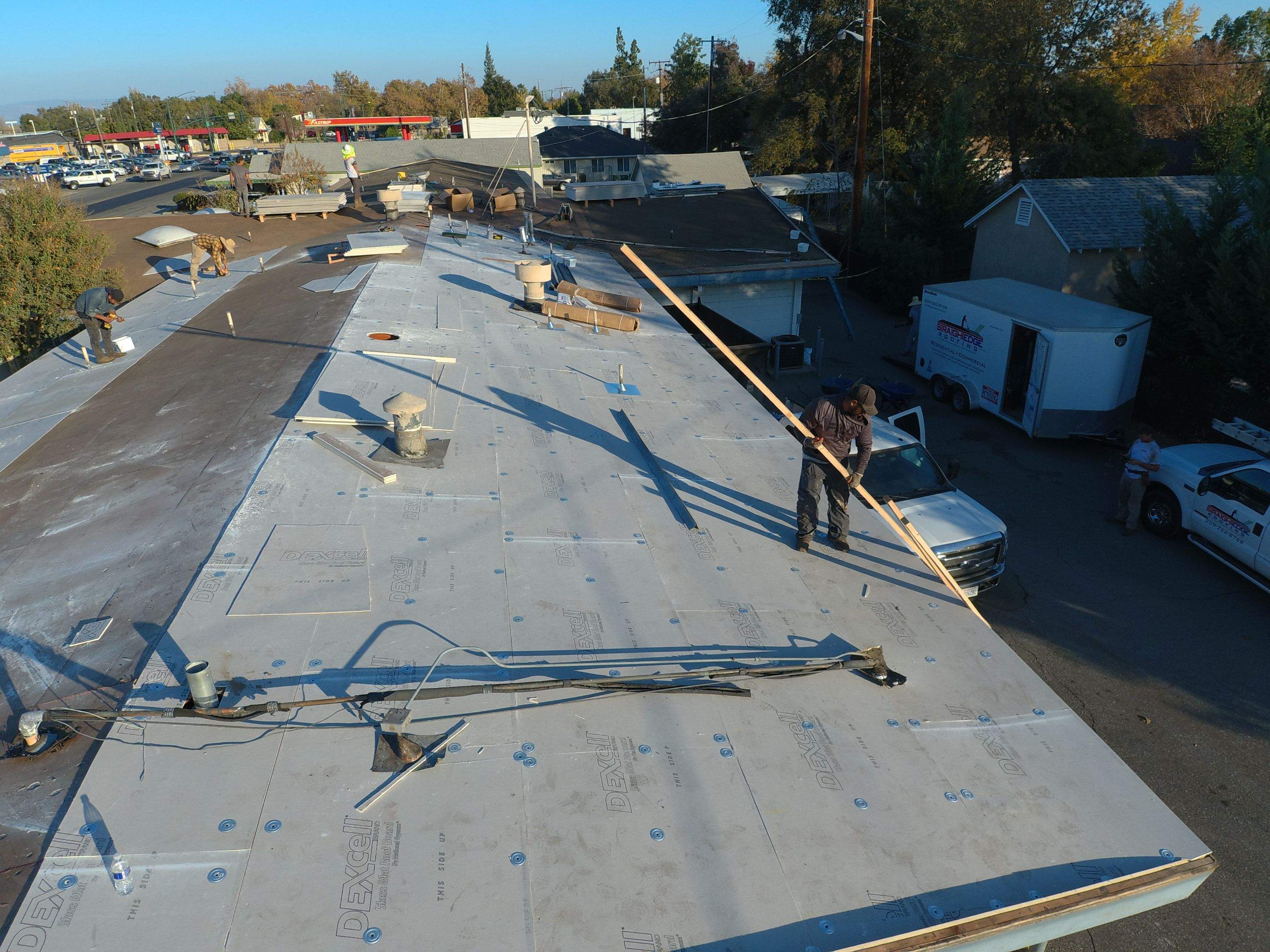 Spray foam and coatings using Conklin Benchmark/PUMA XL coatings and spray foam by Straight Edge Roofing Inc