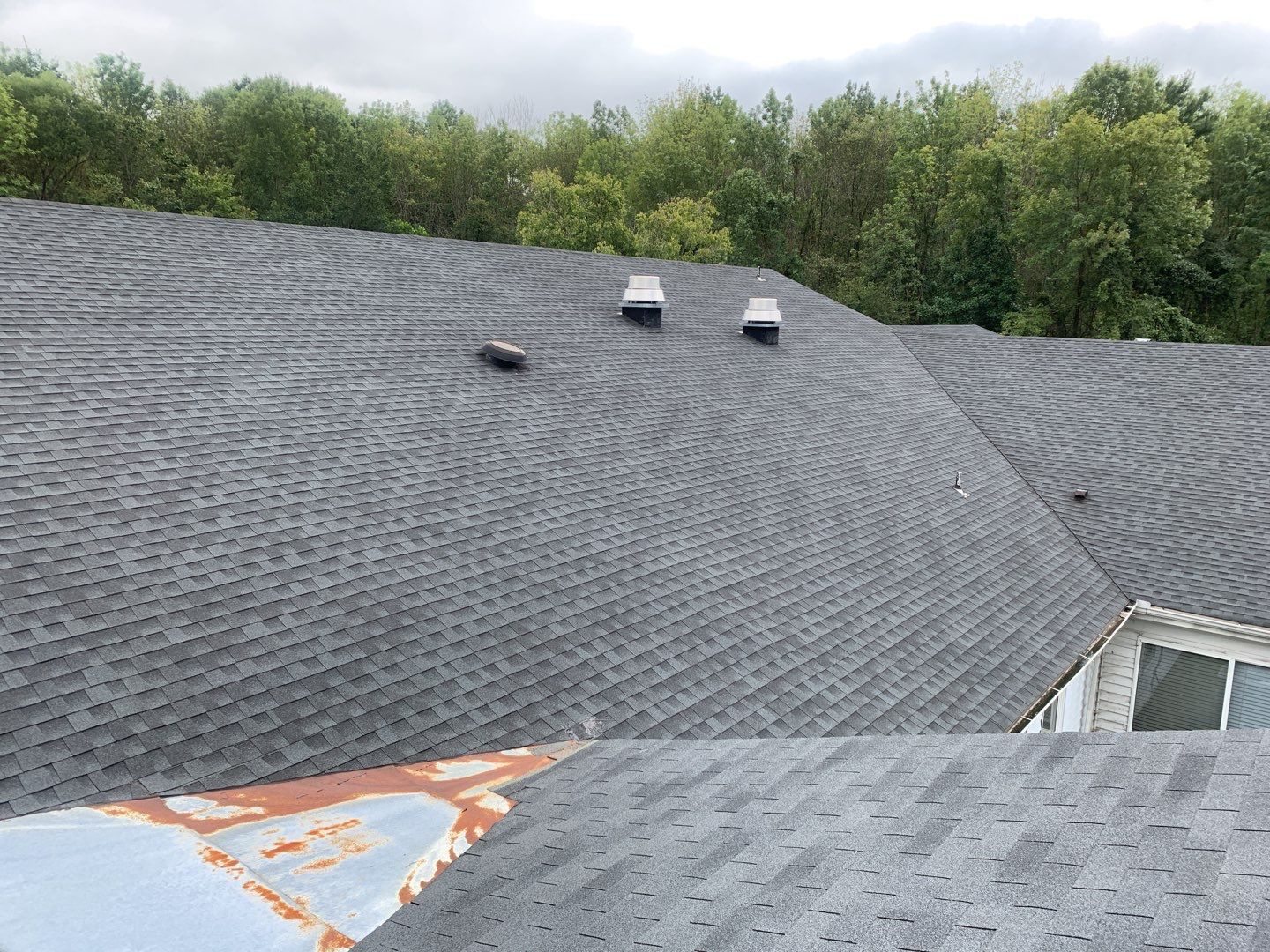Re Roof  by American Roofing NC