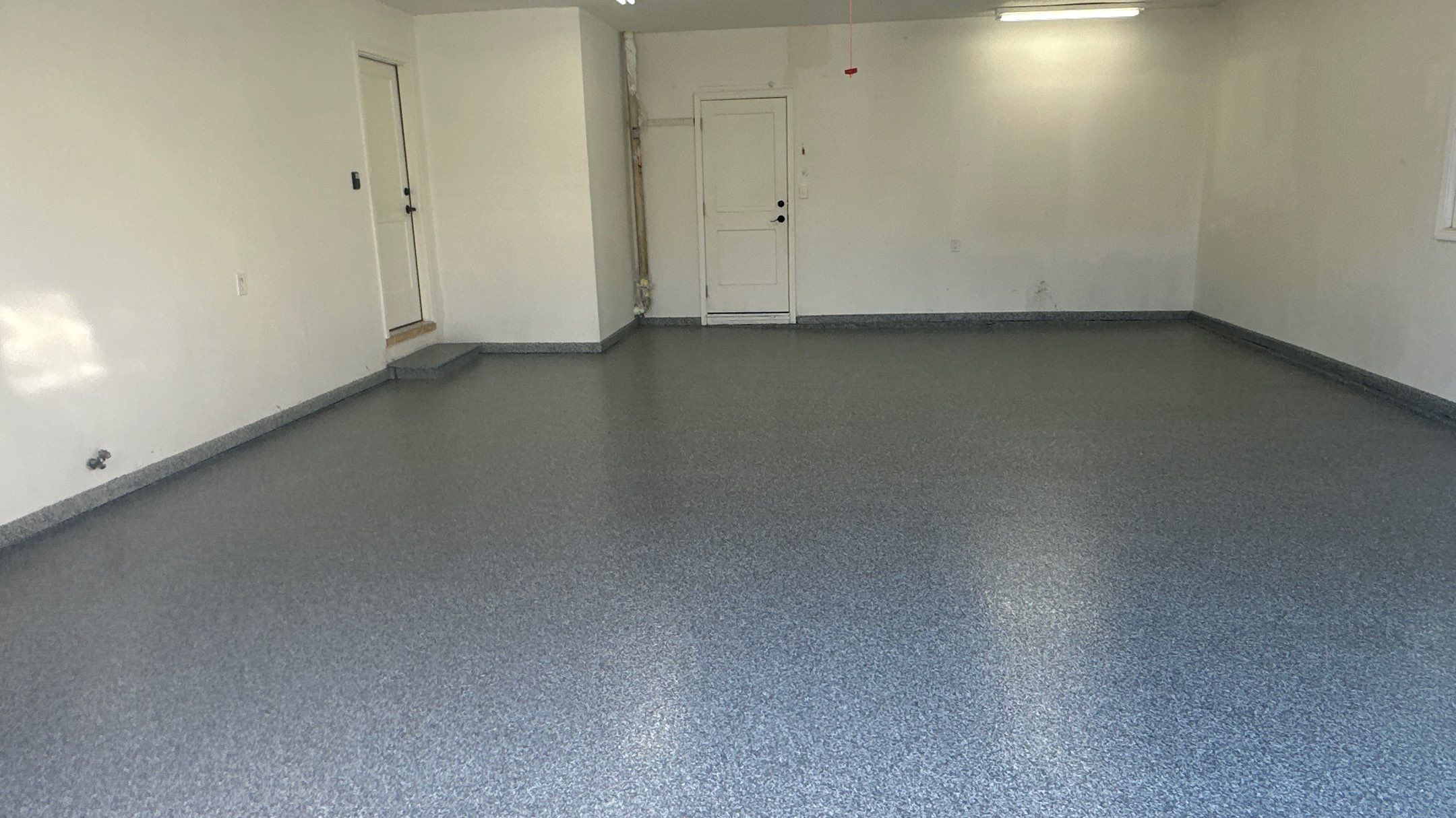 Check Out Anne's New Polar Floor by Banner Garage