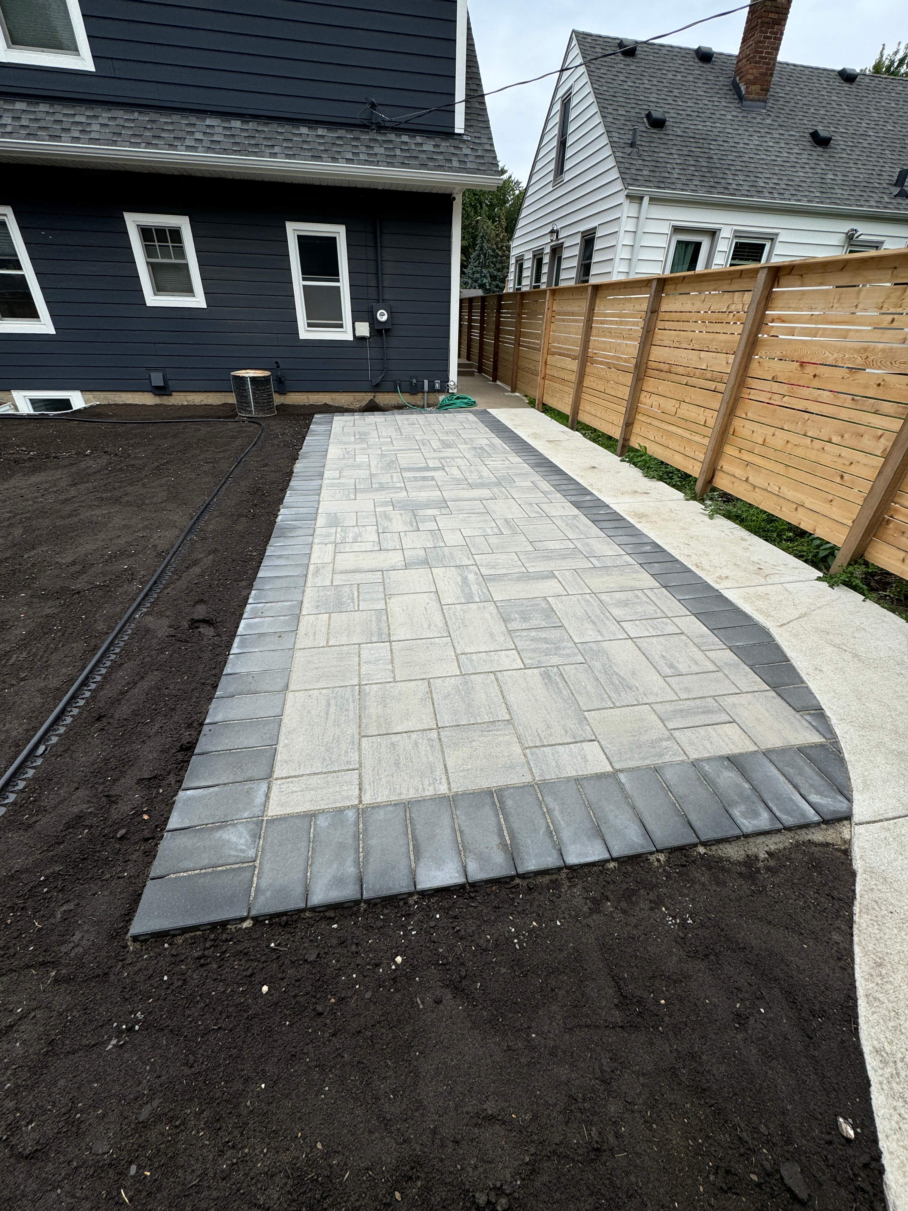 Patio by Sota landscaping