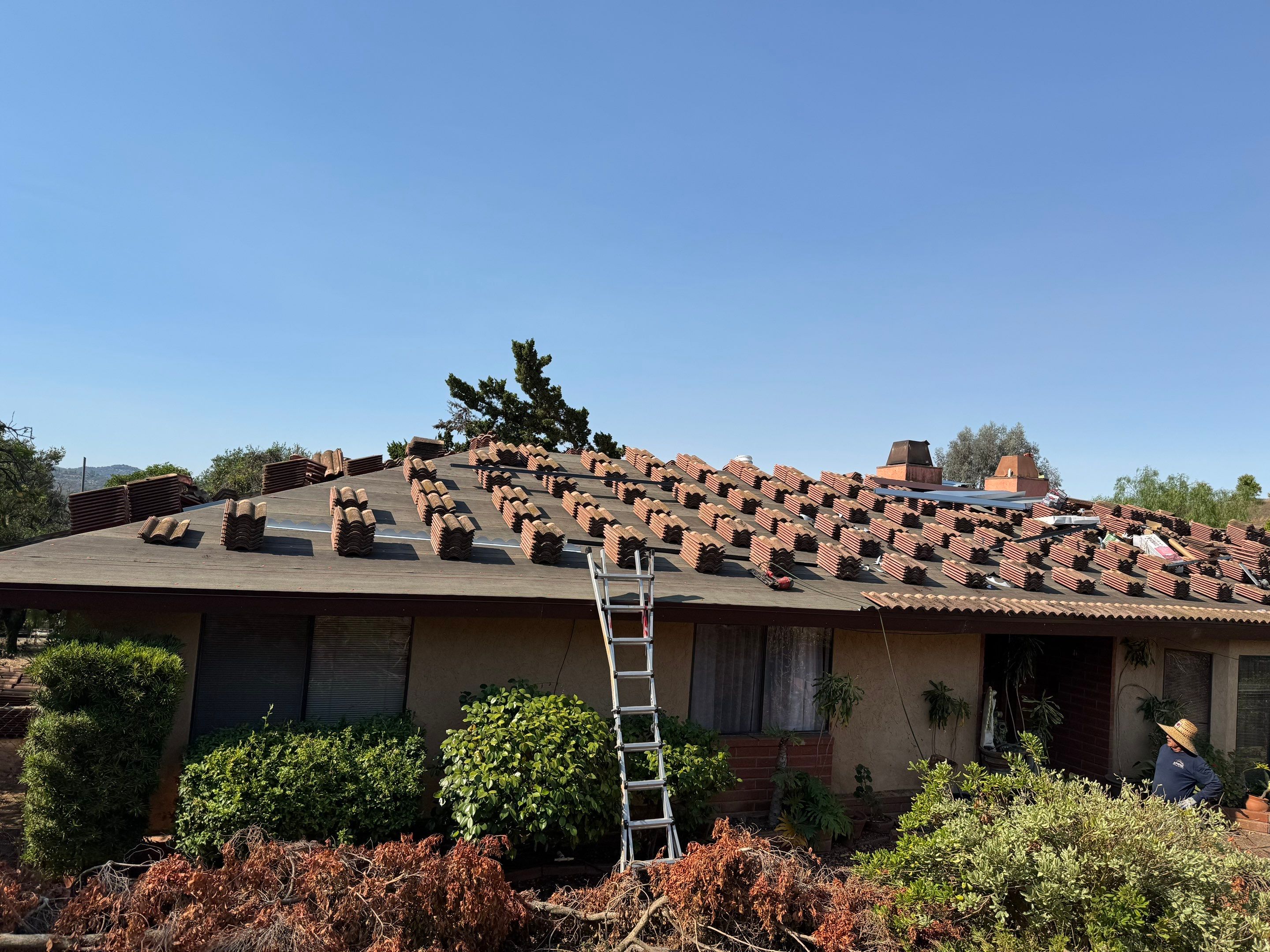Valley Center Tile Roof Lift & Lay | Custom Metal Bird Stop for Los Arcos Tile by Zenith Roofing Services