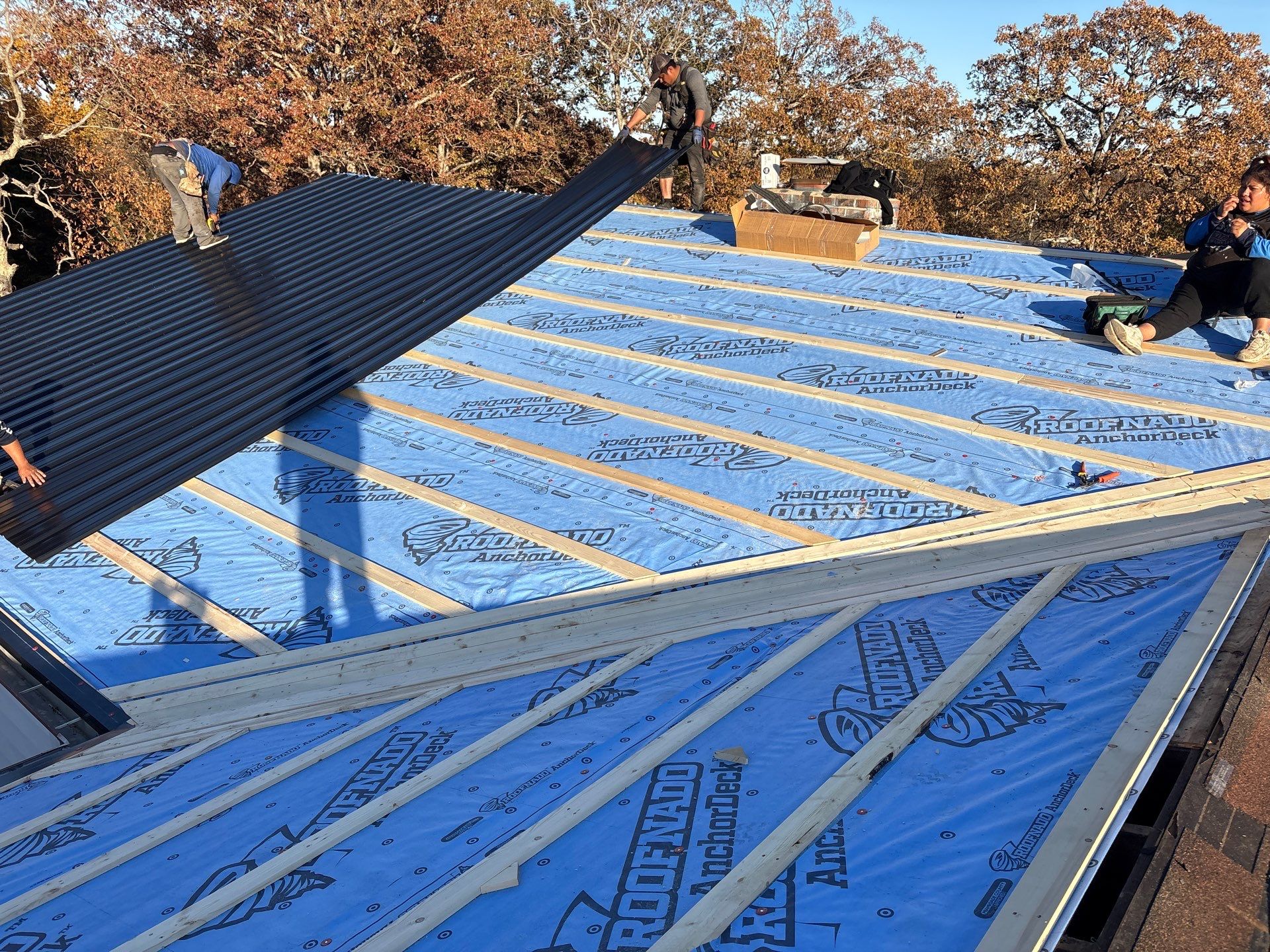 Residential Metal Roof Install - 26 Gauge G-Rib Metal - Color Shiny Black  by Titan Commercial & Residential Roofing 