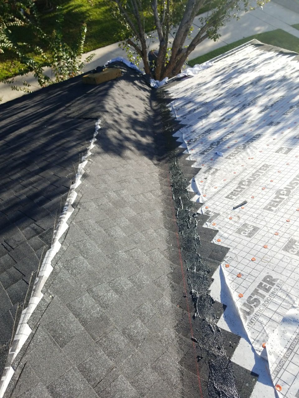 Residential Roofing Installation using Roof Replacement by American Roofing & Construction LLC