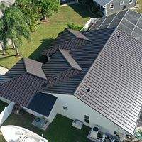24ga 1.5" Mechanical Seam Dark Bronze by Total Roofing System The Metal Roof Experts