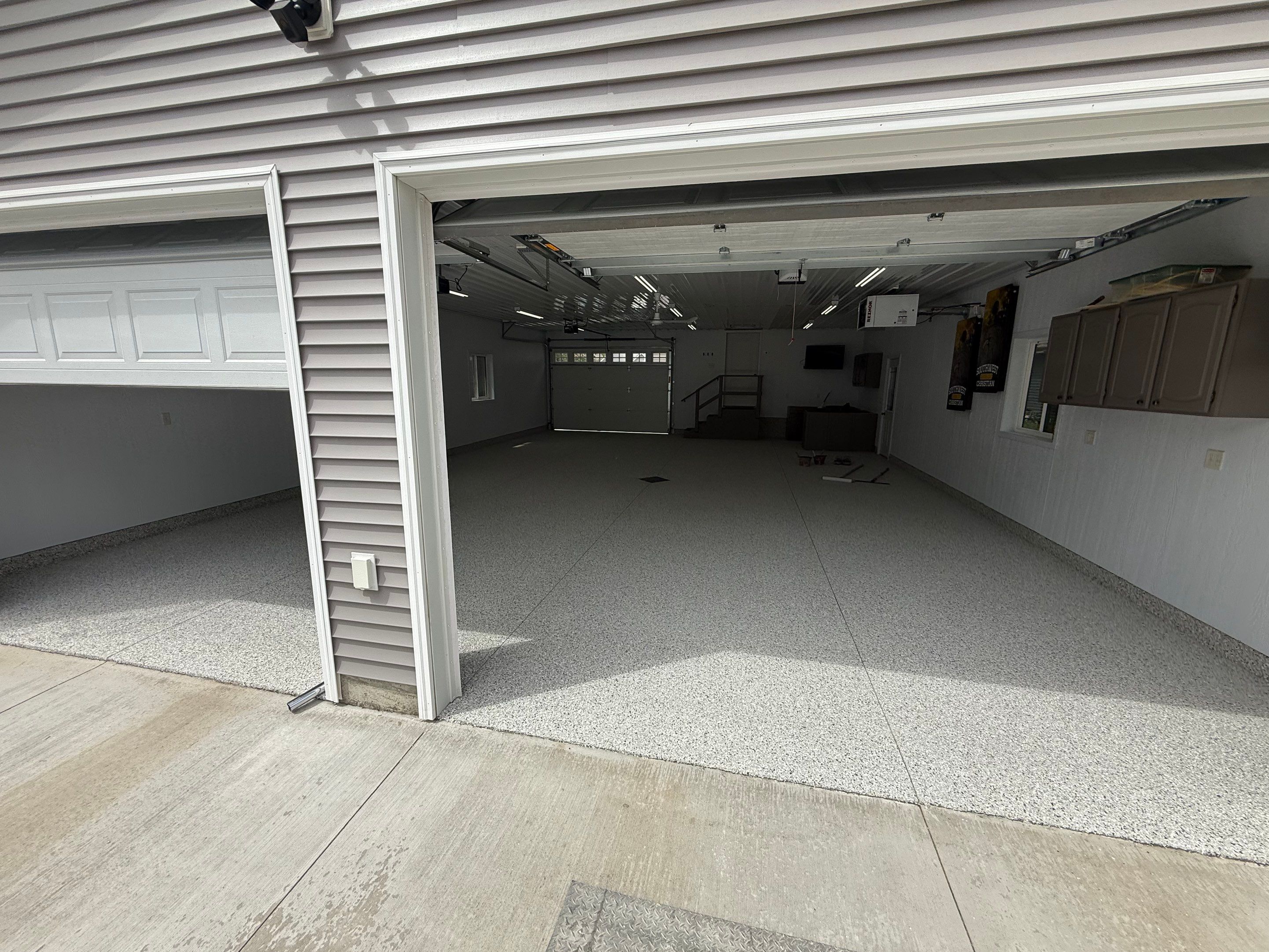 Speckled Epoxy Concrete Coating for Edgerton Garage Floor by Select Painting, Coatings & Garage Cabinets