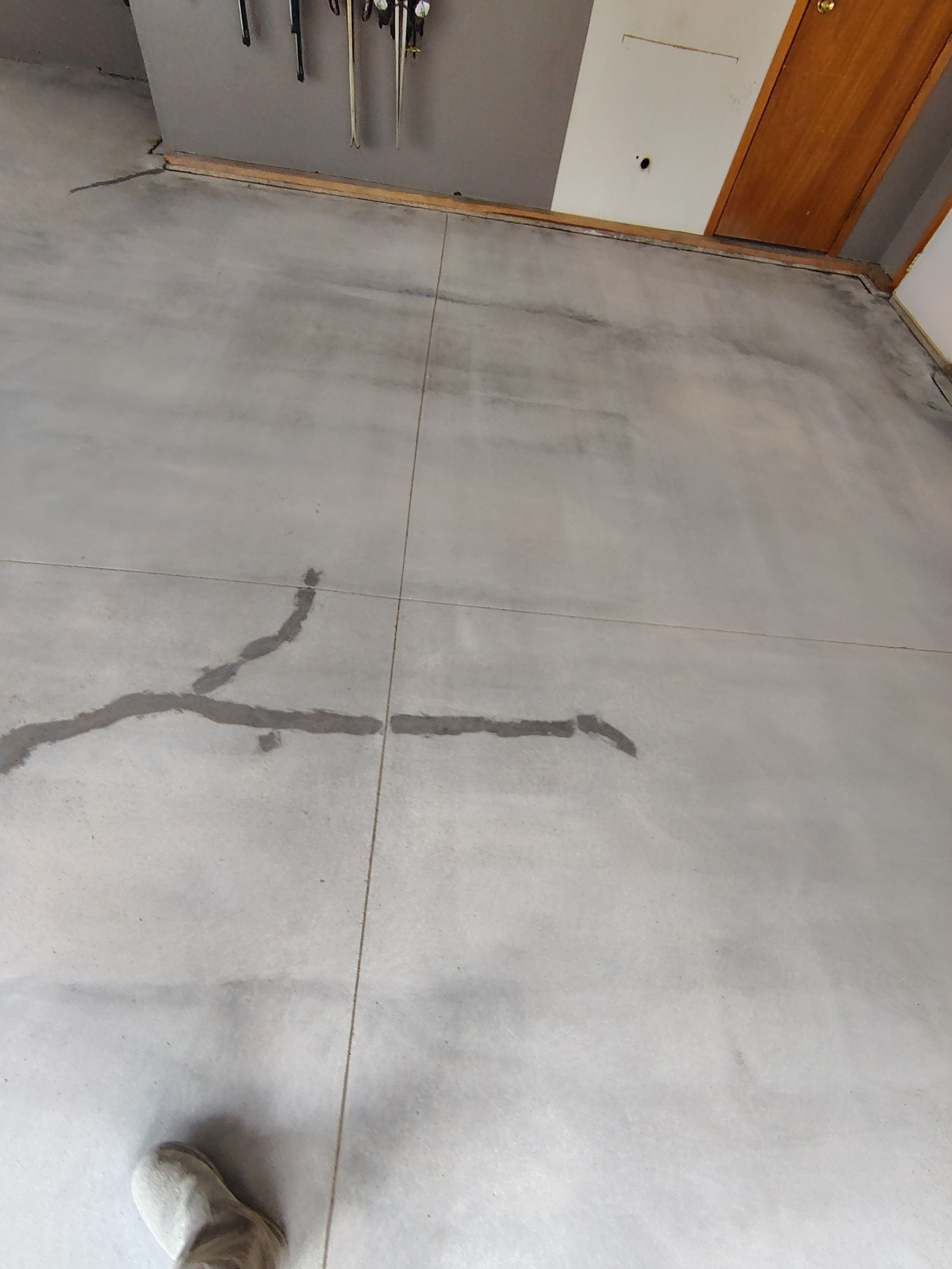 Garage Floor Concrete Coating and Crack Repair in Sioux Falls by Select Painting, Coatings & Garage Cabinets