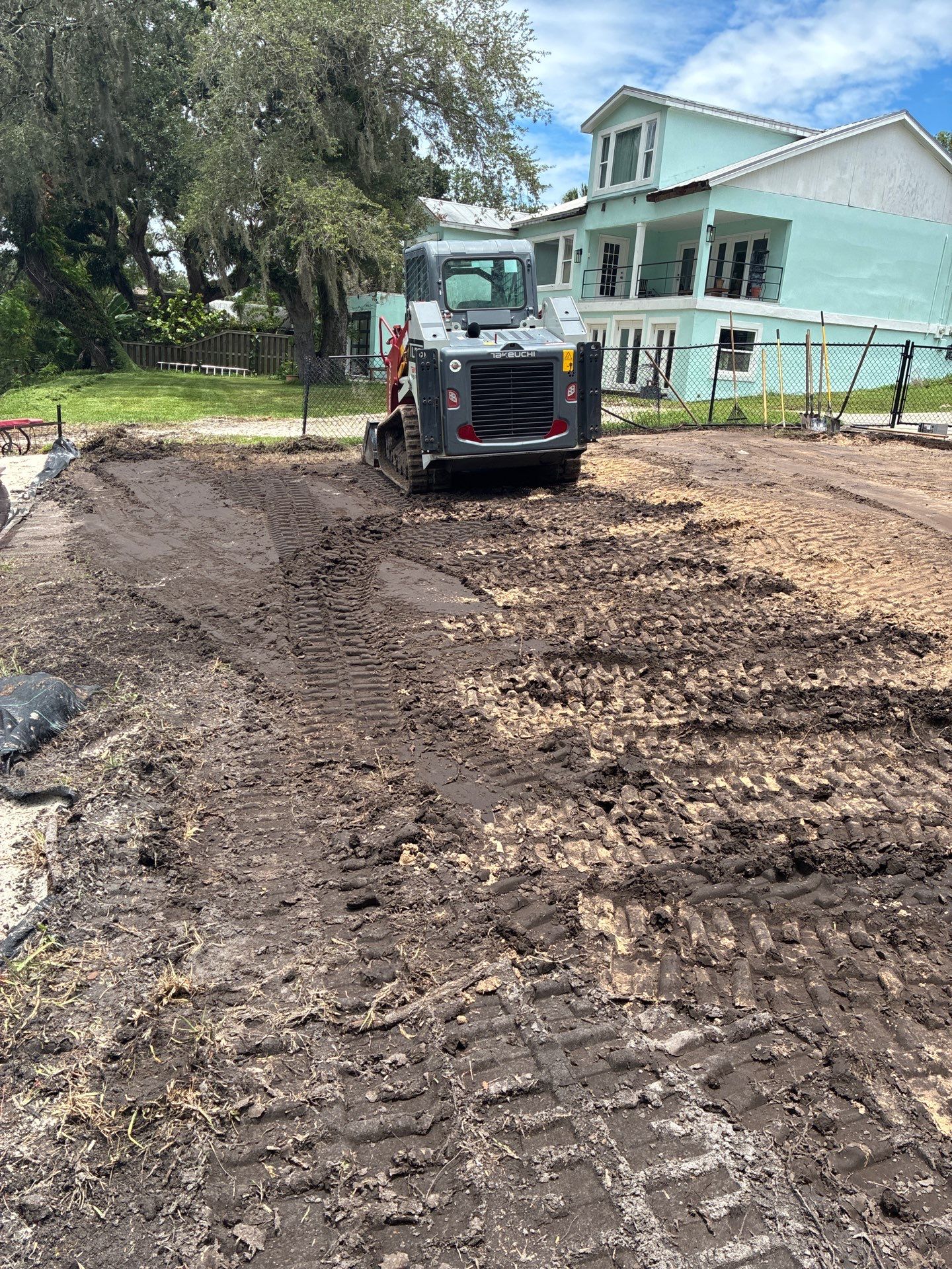 Grading back yard oasis by Level One Grading 
