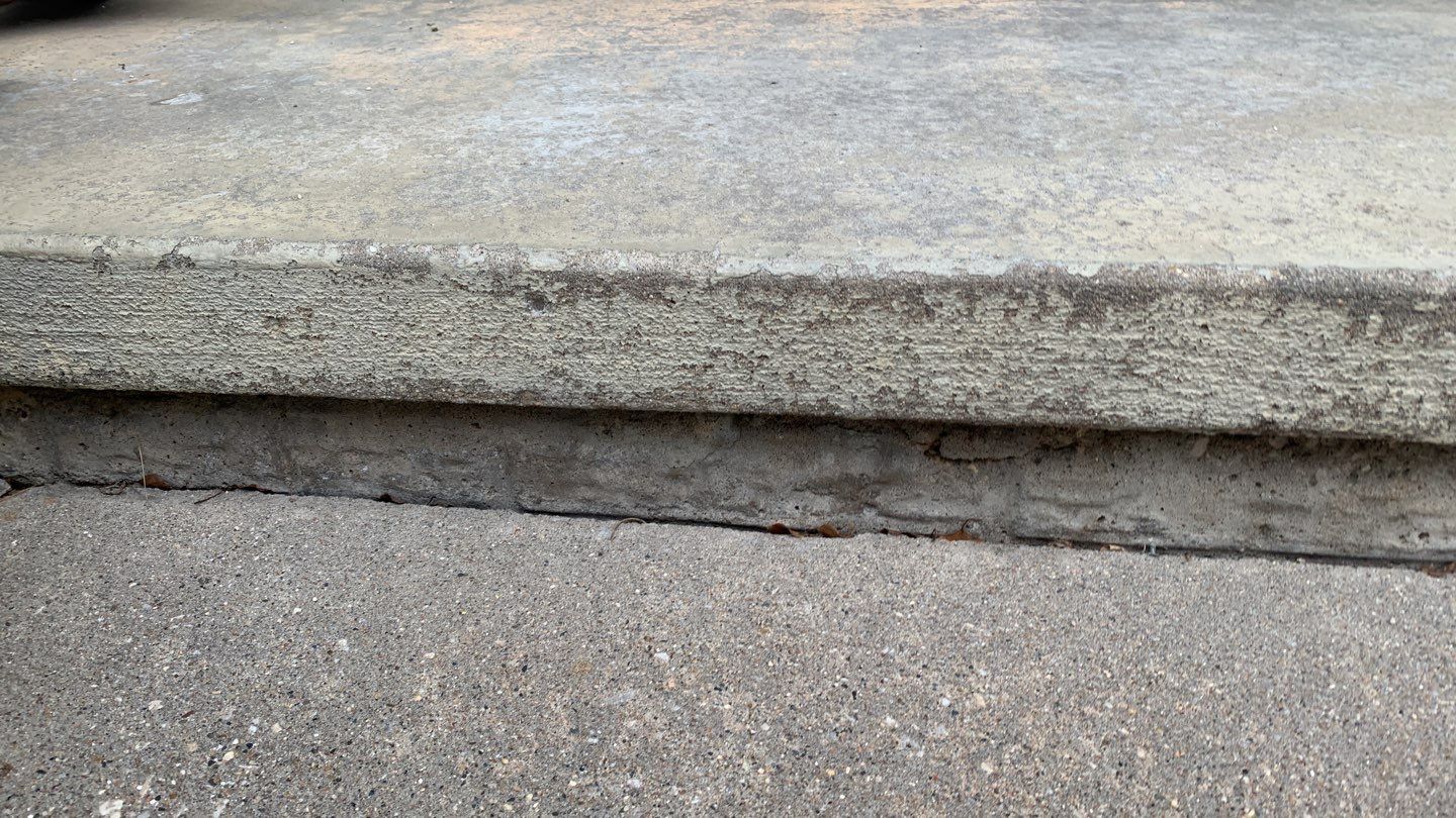 West Des Moines Garage and Patio Floor Coating using Pebble Beach Flakes by Revival Concrete Coatings