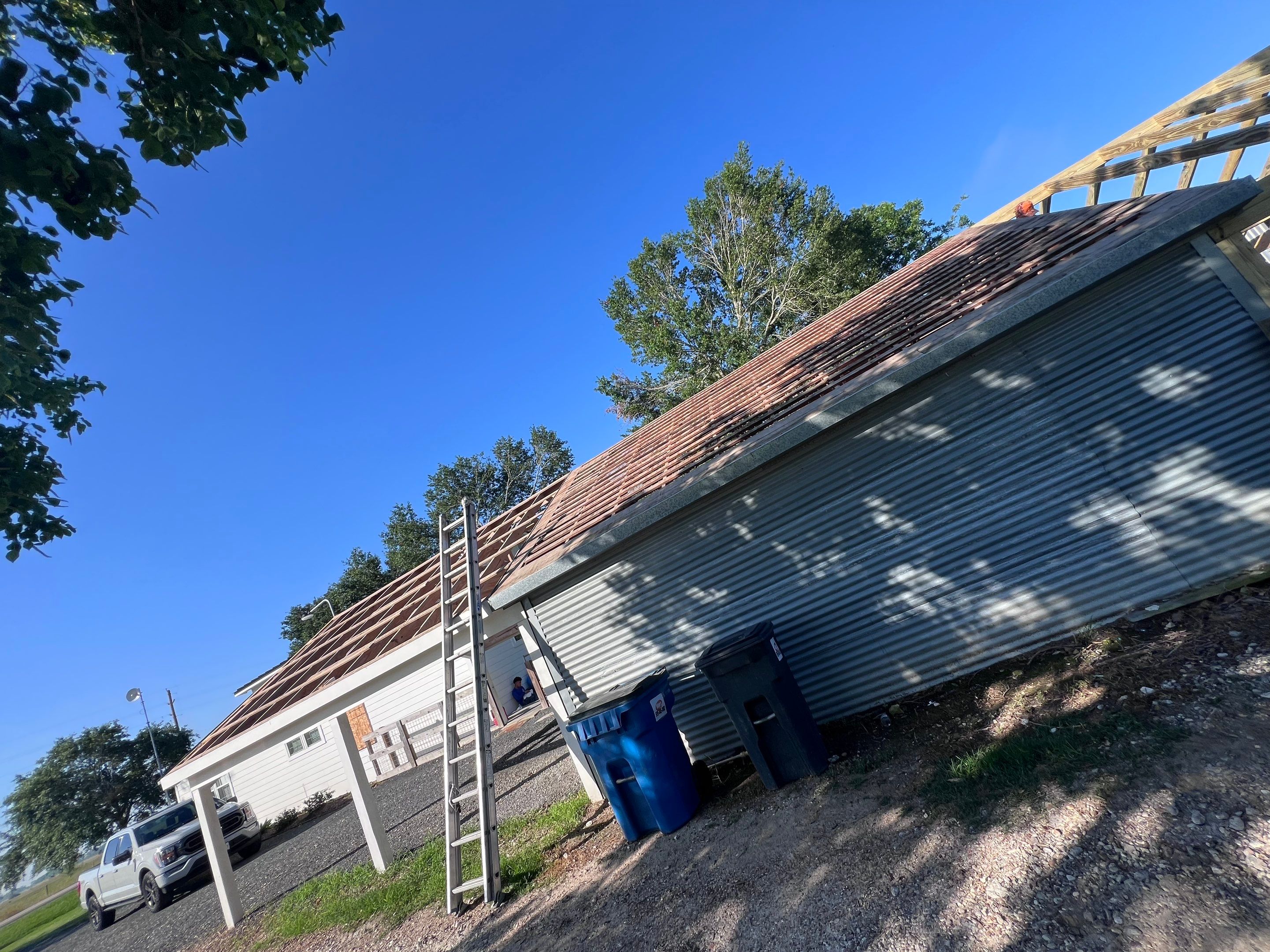 Residential Roofing Installation using Metal by Roof Repair Company