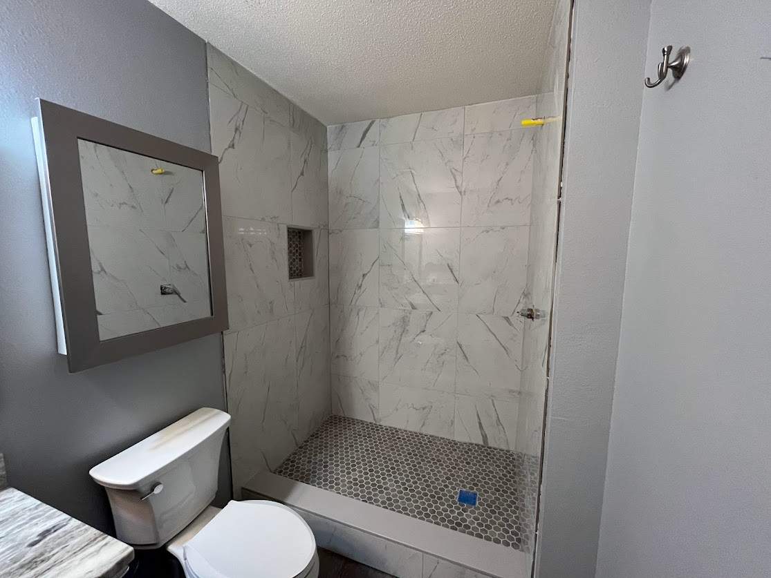 Converting Fiberglass Shower/Tub into Walk in Shower by Geaux 2 Guy, LLC