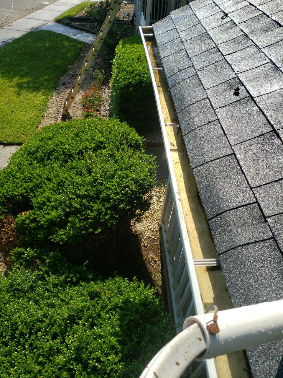 Gutter Cleaning using water by Power Wash Masters LLC