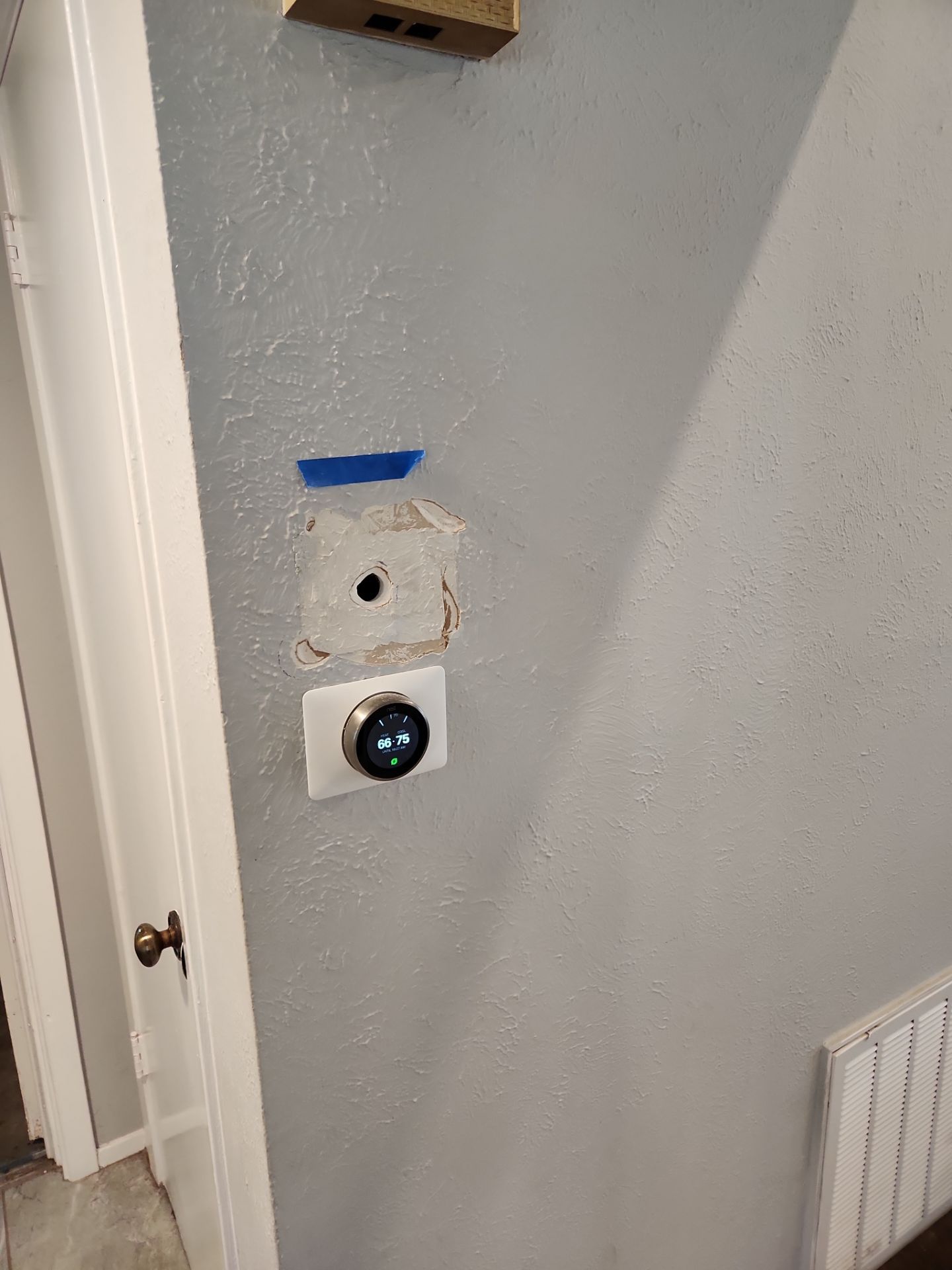 Drywall repair and door painting in S. Austin-78745 by RejuveNate Renovations LLC