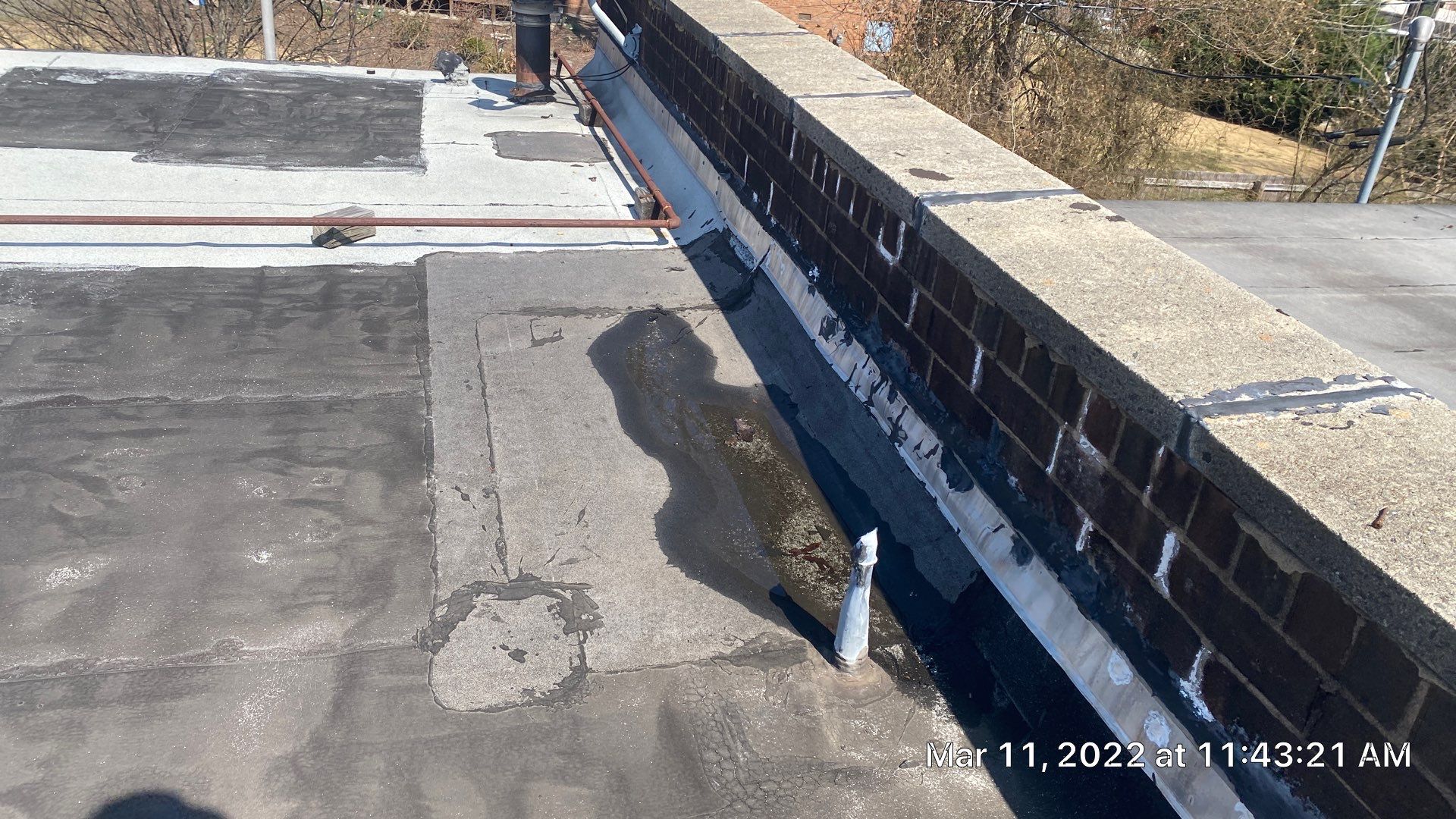 Commercial Roof Coating using Fiberseal basecoat and Silicon Topcoat by Just In Time Roofing and Restoration