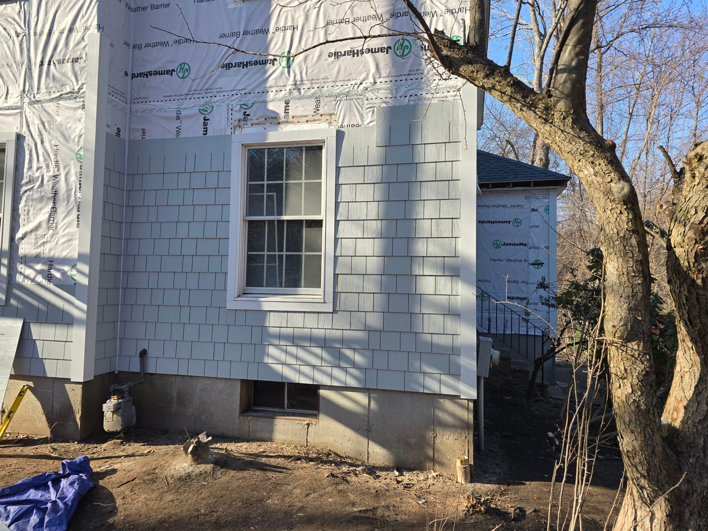 Siding and roof replacement in Framingham, Ma by UBrothers Construction