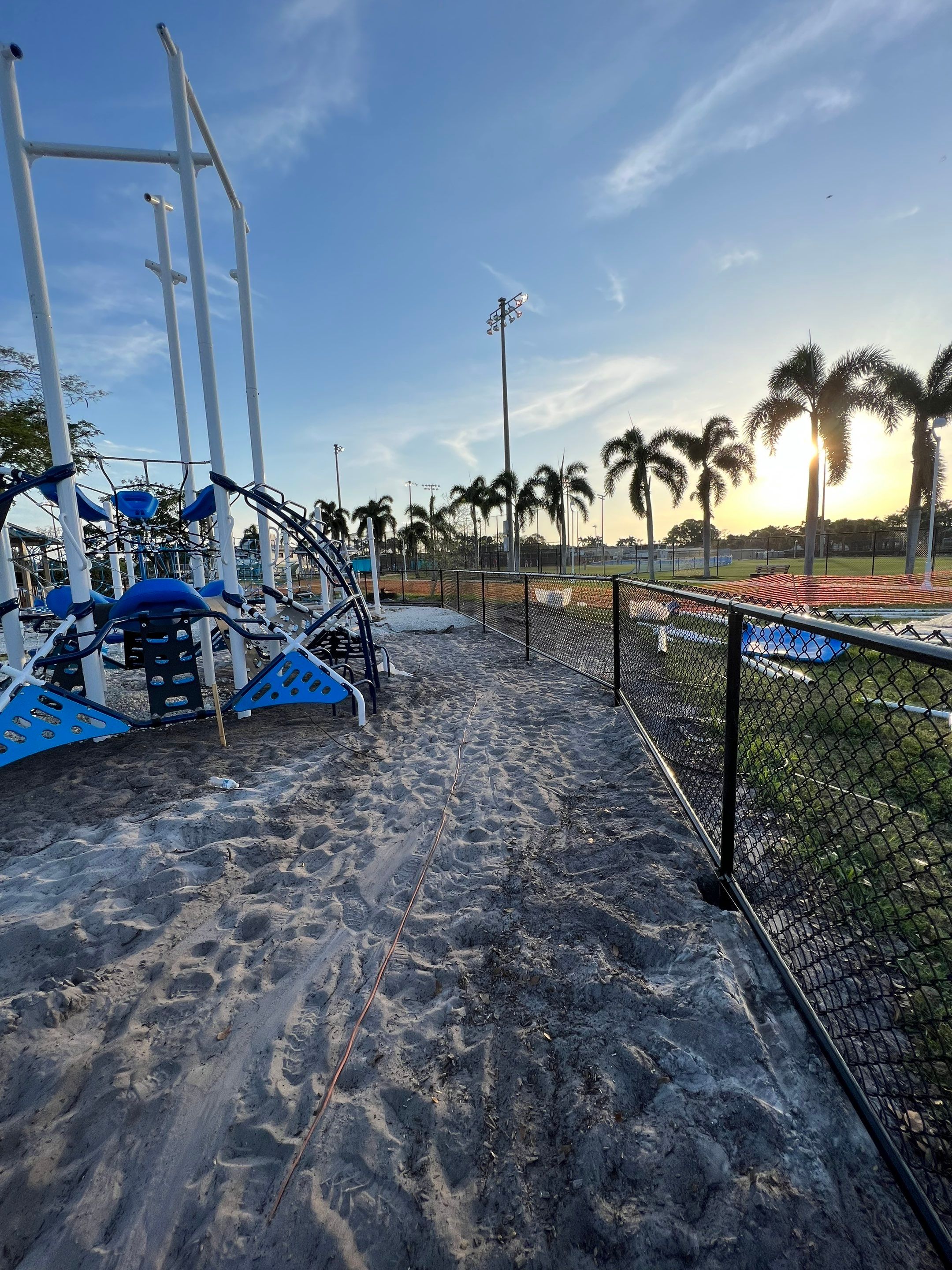 Vinyl Coated Chain-link fence for the City of Naples around Fleischmann Park Playground.  by Asap fence and gates, LLC