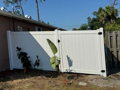 White Vinyl Privacy Fence and Gate Repair in North Port