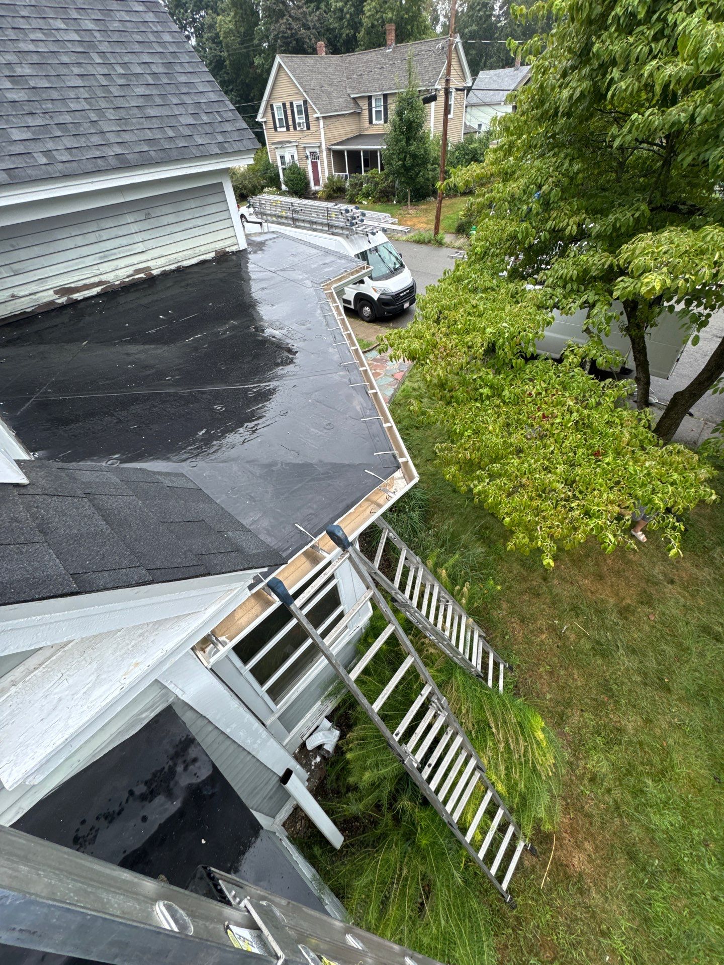 Full Roof Replacement + Custom Gutter Install | Onyx Black Finish by Mighty Dog Roofing of Greater Middlesex County