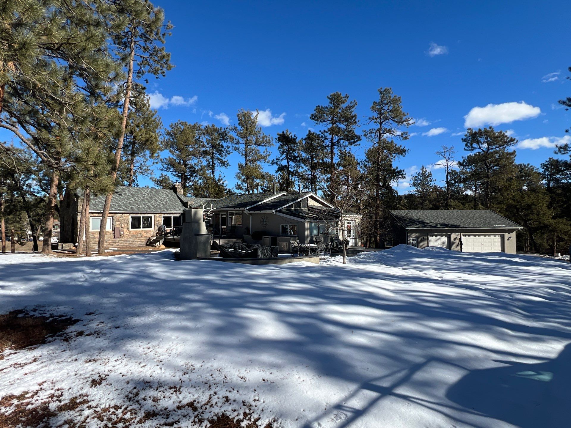 Residential Roofing Installation using Stone Coated Steel by Blue Peaks Roofing LLC 