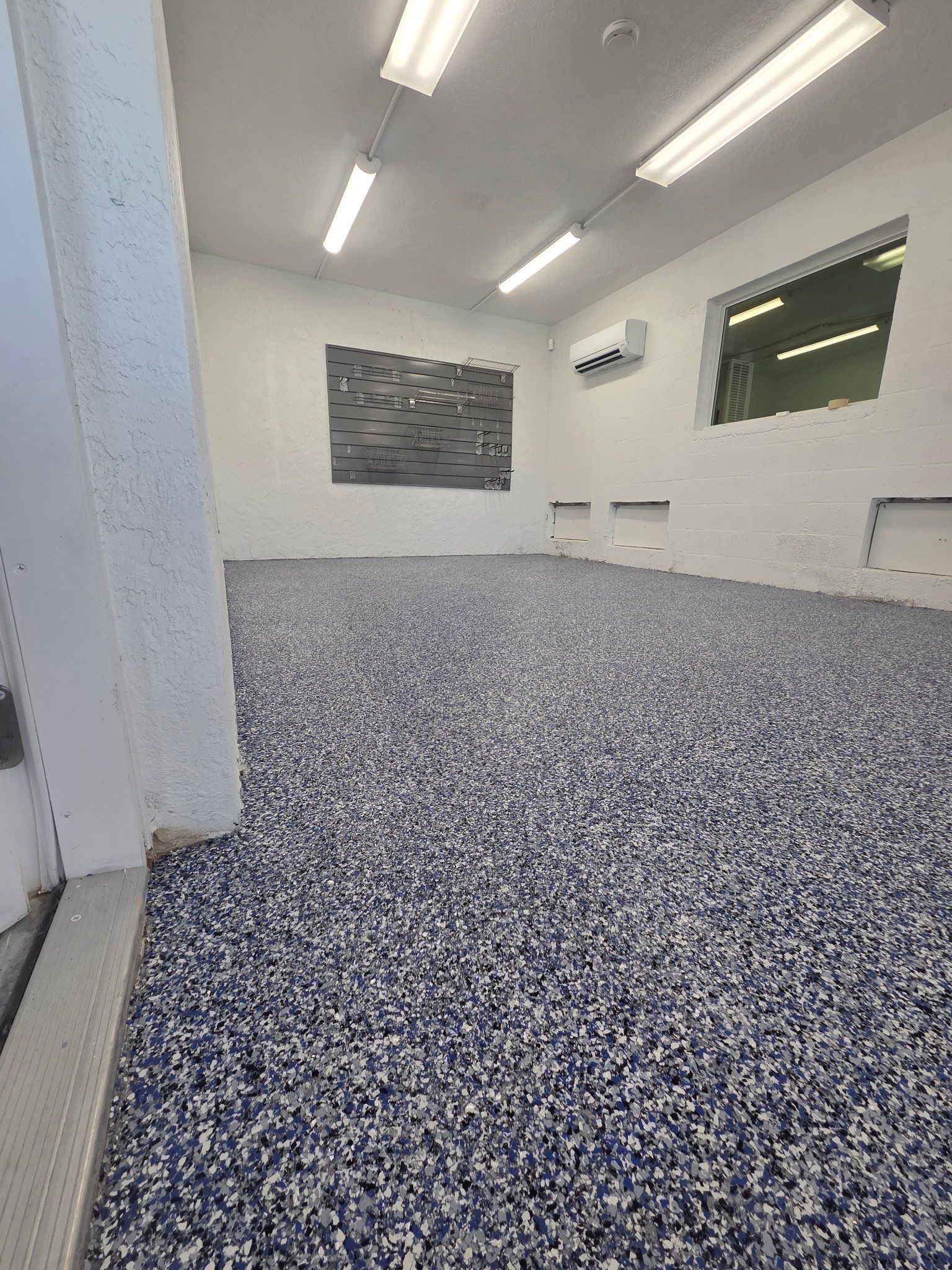 “Orbit” Tackle Room Project in Duck Key, FL by Tropical Epoxy Coatings & Creations LLC