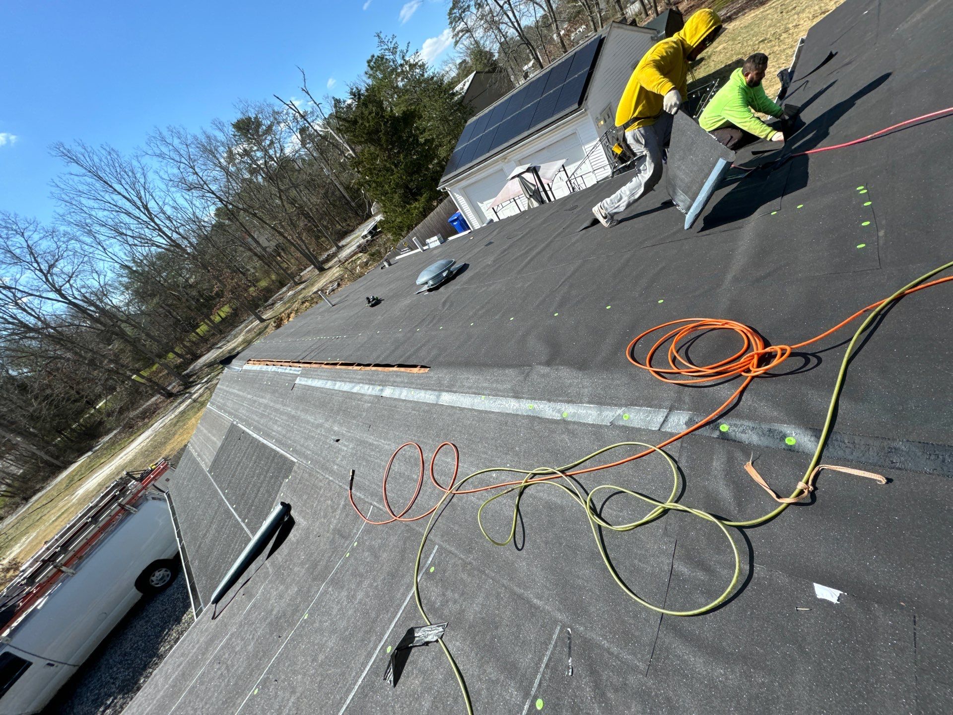 Onyx Black Shingles by Reimagine Roofing