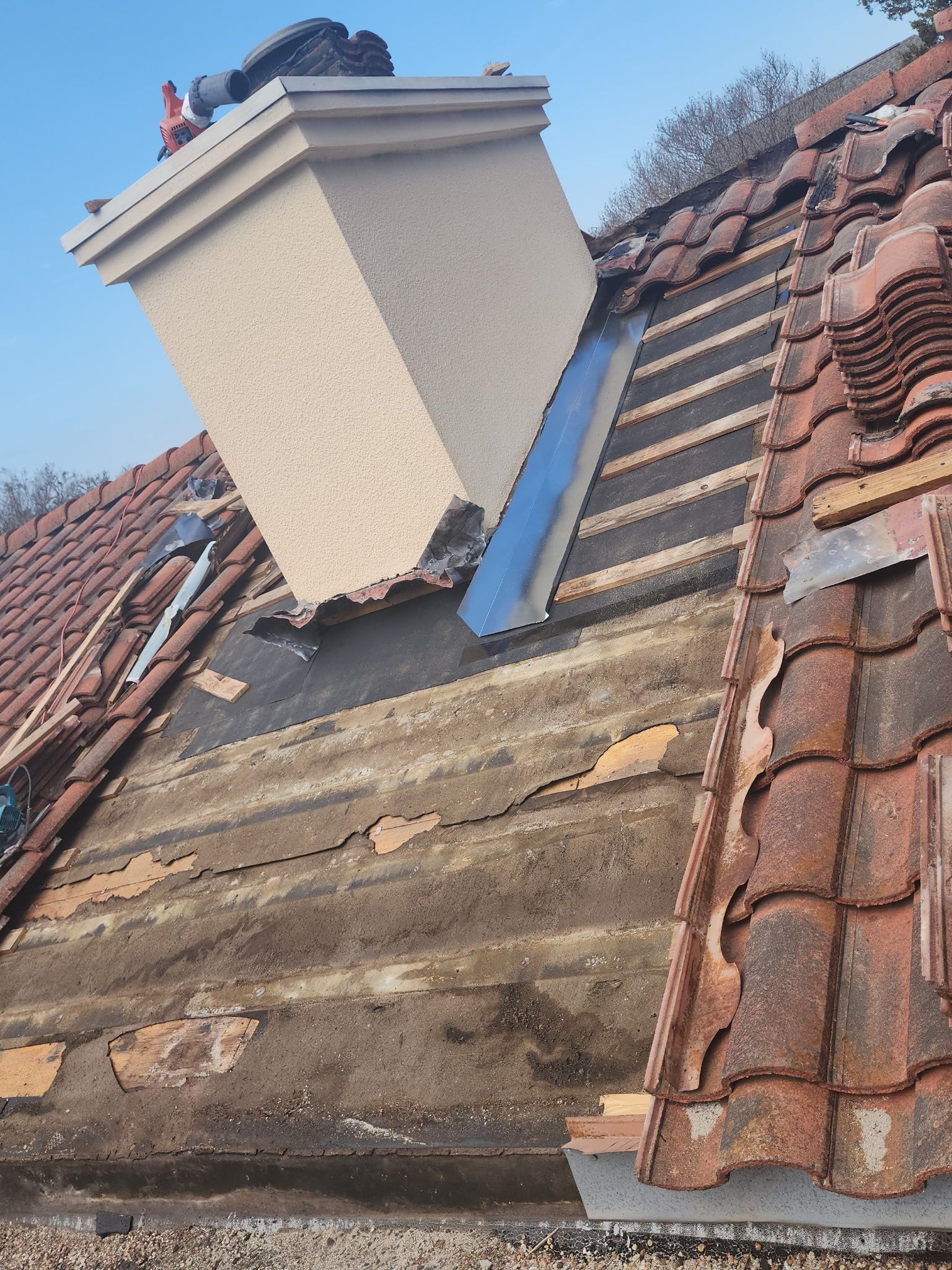 Specializing in tile roof repairs by REPS Austin Area Roofer