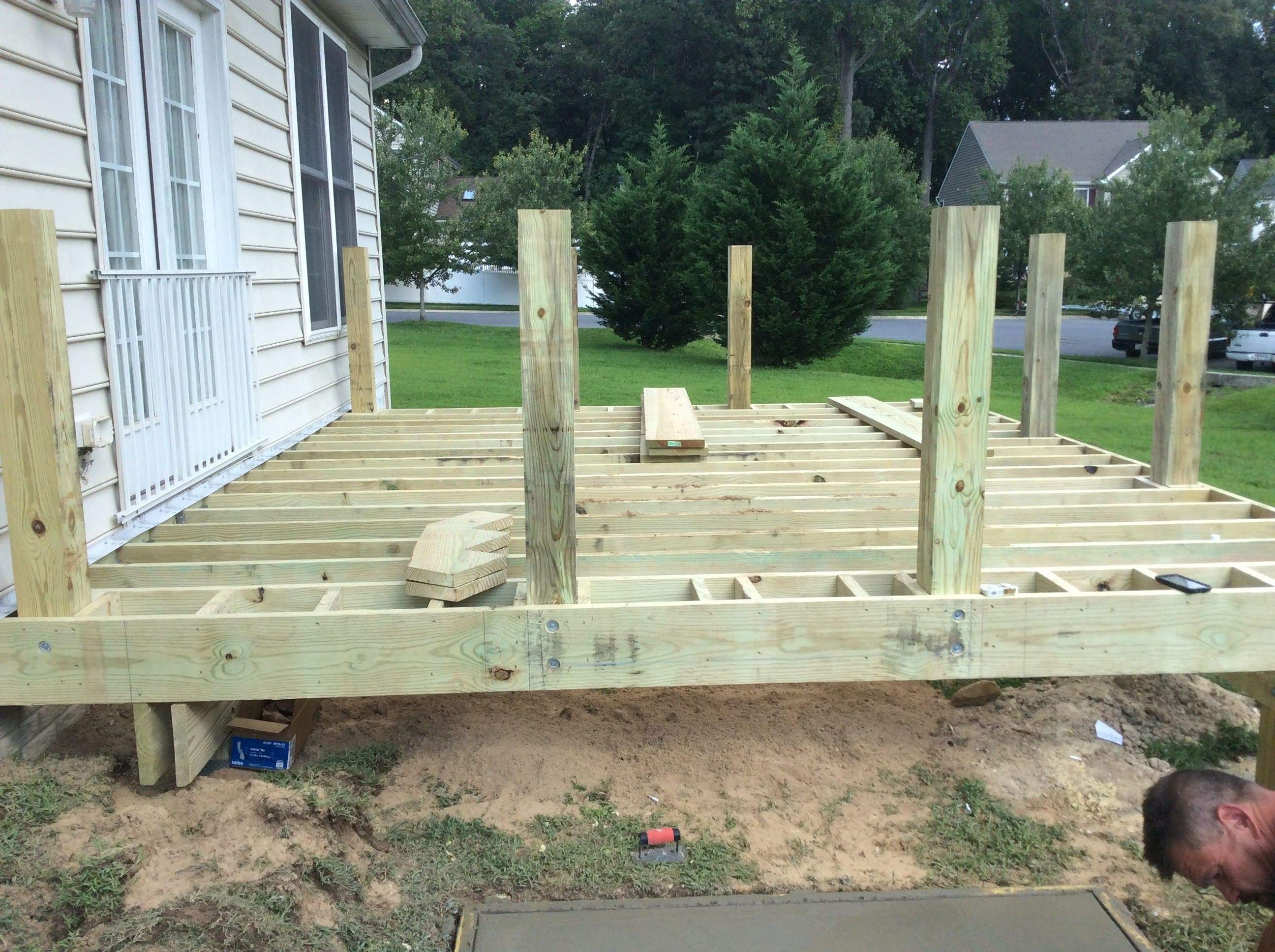 Deck Installation using New Composite Deck Board by Alpha Design Services