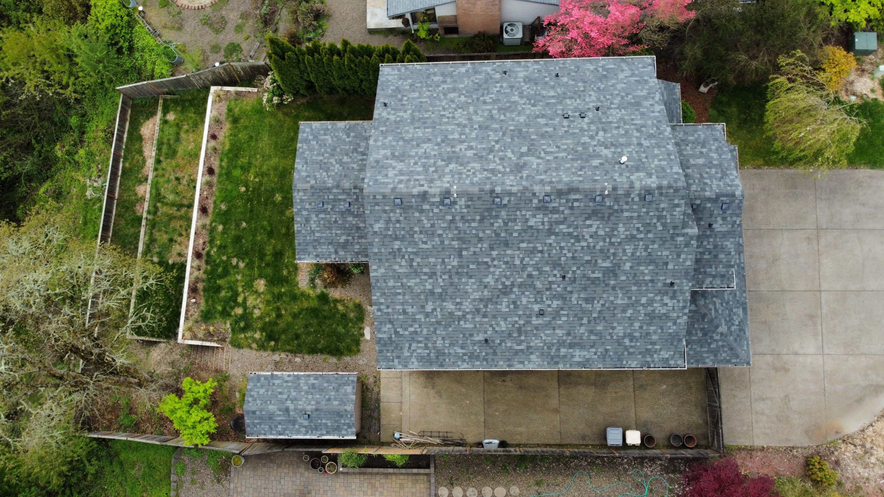 Residential Roofing Installation using Malarkey Vista AR Shingles (Color: Storm Grey) by Orezona Building & Roofing Company, Inc.