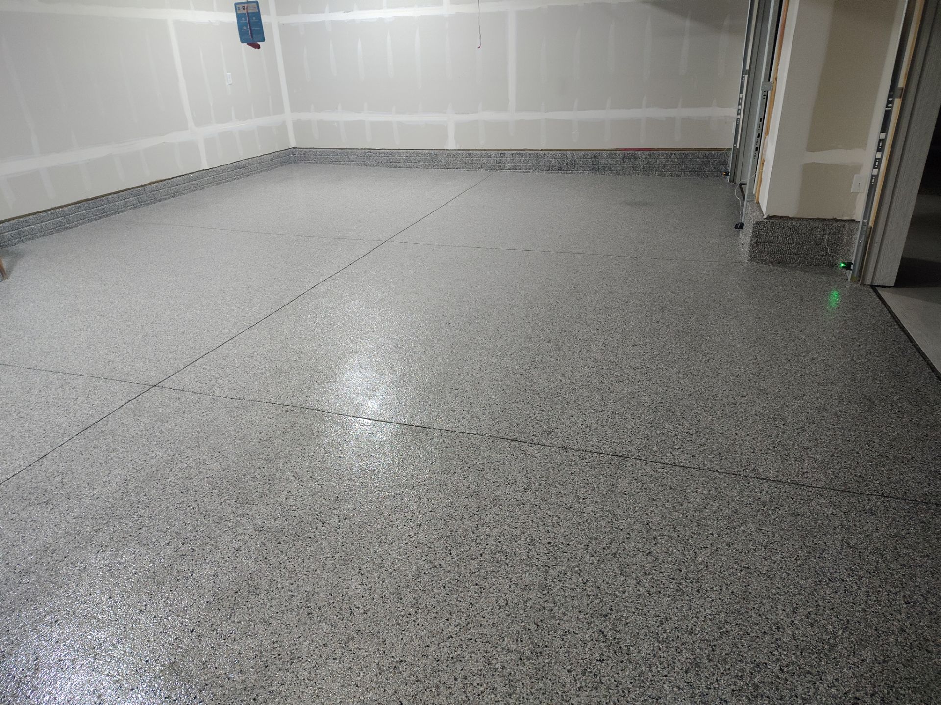 Adel, IA Garage: Complete Keystone Wrap on Floors, Stairs, and Stem Walls by Revival Concrete Coatings