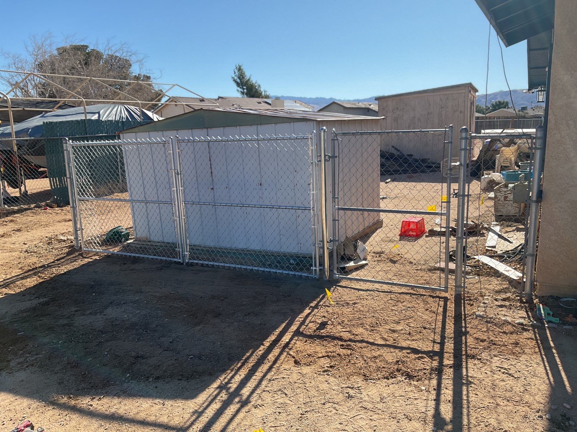 Chain-link gate installation  by Fence Guys Inc. 