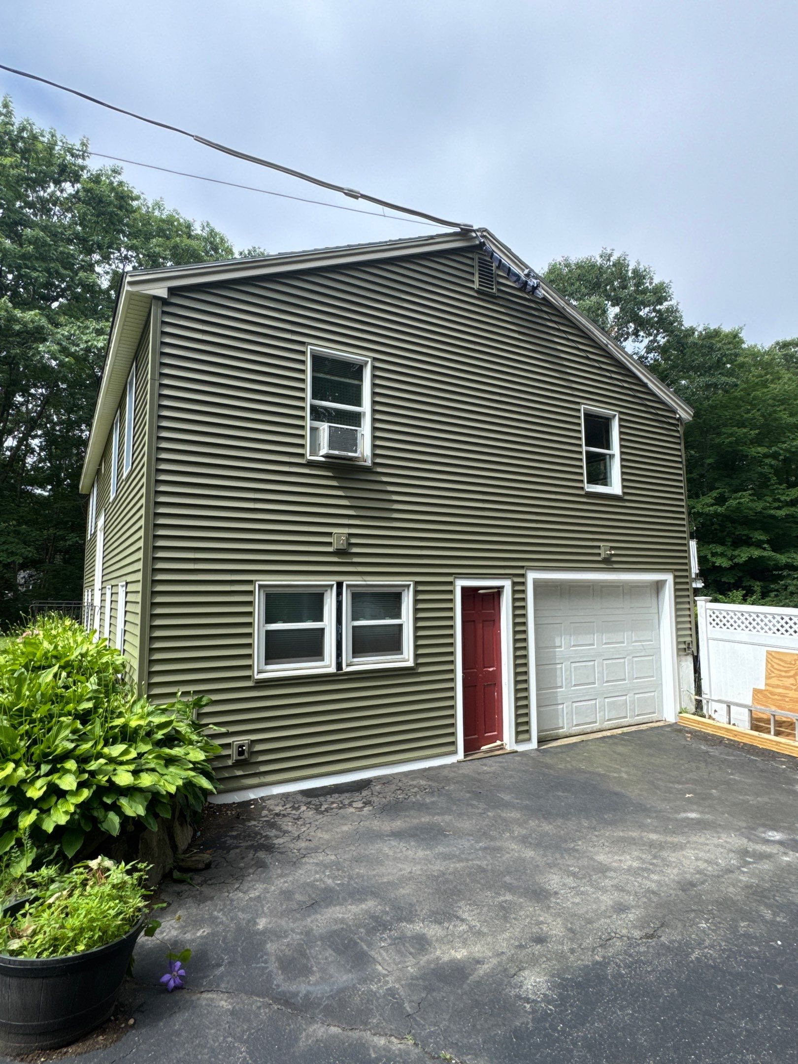 Full Siding Replacement in Newmarket, NH with CertainTeed Vinyl Siding and New Front Door Installation by Compass exteriors